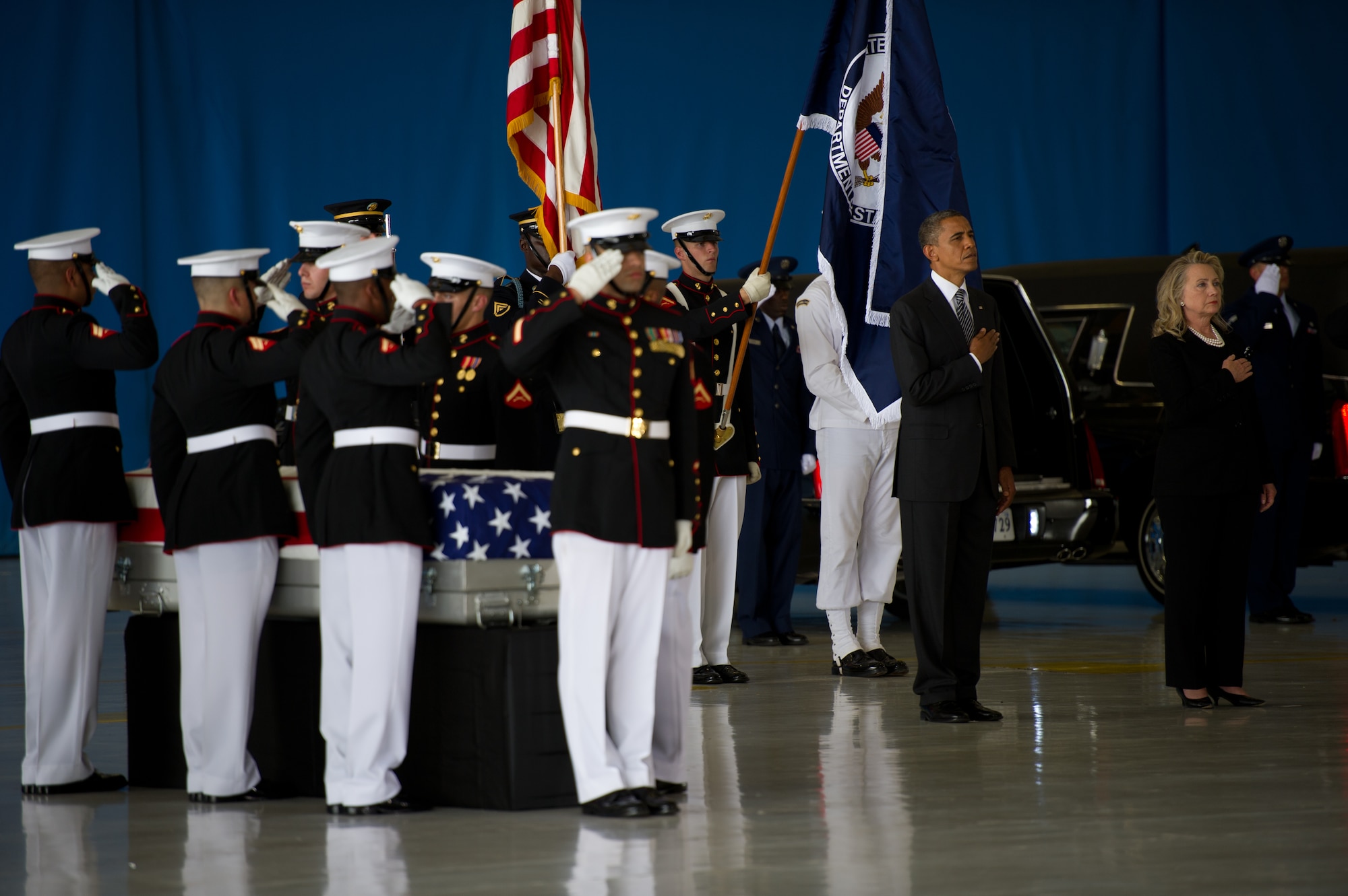 The United States Air Force Band plays the national anthem during the dignified transfer of the remains J. Christopher Stevens, U.S. ambassador to Libya, and three other Americans, Sept. 14, 2012, at Joint Base Andrews, Md. The U.S. State Department held a ceremony on base to honor the Americans who gave their lives in service to their country. (U.S. Air Force photo by Senior Airman Perry Aston)