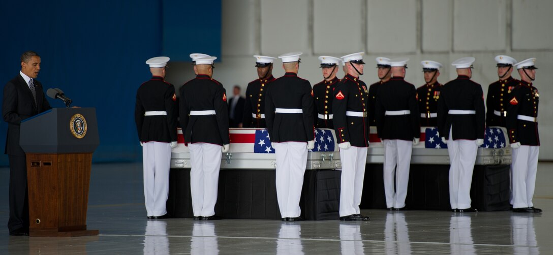 President Barack Obama speaks during the dignified transfer of remains for J. Christopher Stevens, U.S. ambassador to Libya, and three other Americans, Sept. 14, 2012, at Joint Base Andrews, Md. The U.S. State Department held a ceremony on base to honor the Americans who gave their lives in service to their country. (U.S. Air Force photo by Senior Airman Perry Aston) 