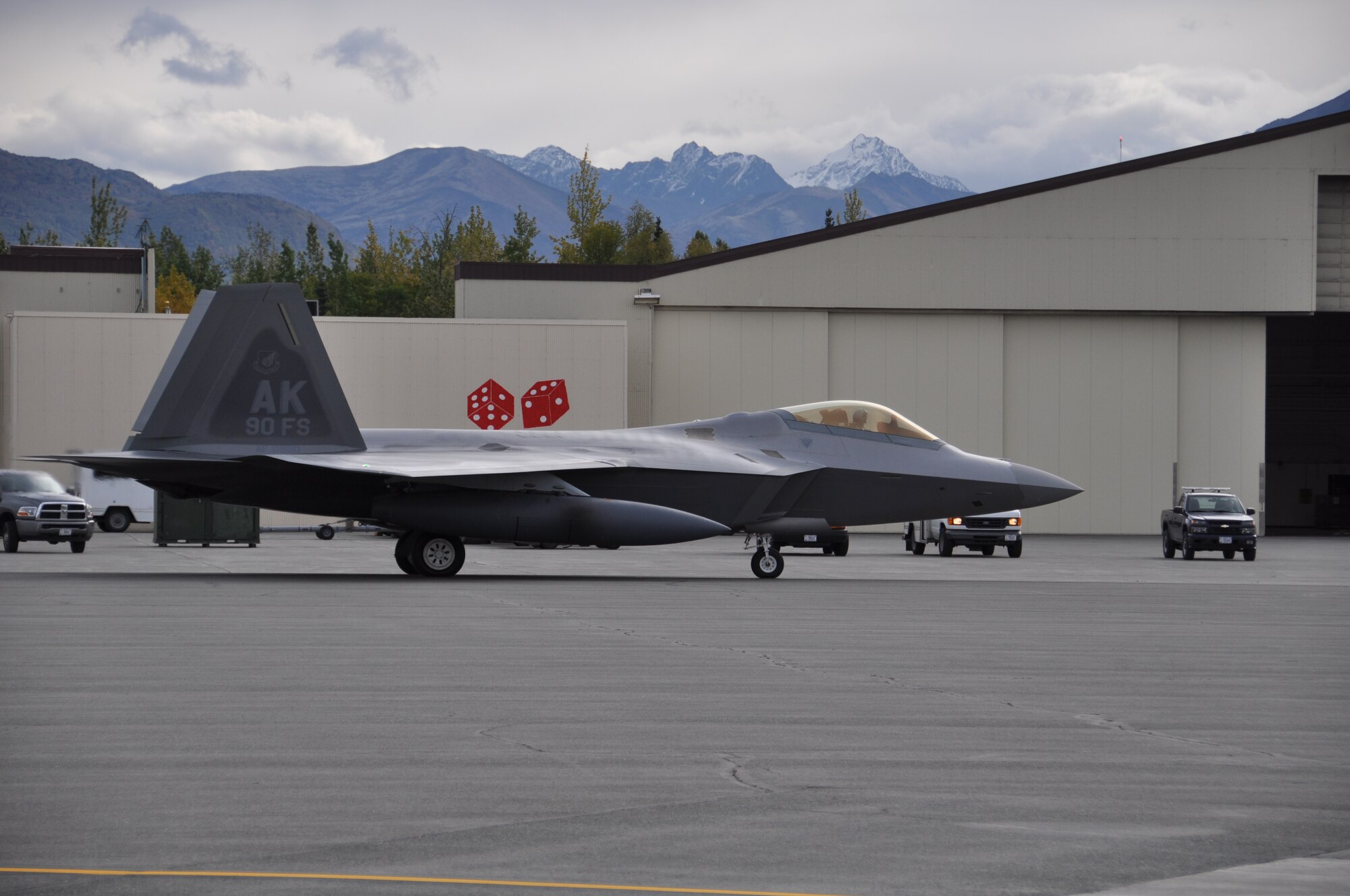 The 90th Fighter Squadron flag ship, aircraft 190 taxies by the 90th FS
prior to its departure from Joint base Elmendorf-Richardson en route to
Andersen Air Force Base, Guam. This marks the first time since 2011 F-22's
from the 3rd Wing have deployed to the Pacific Theater of Operations. (U.S. Air Force Photo/Tech. Sgt. Dana Rosso)
  
