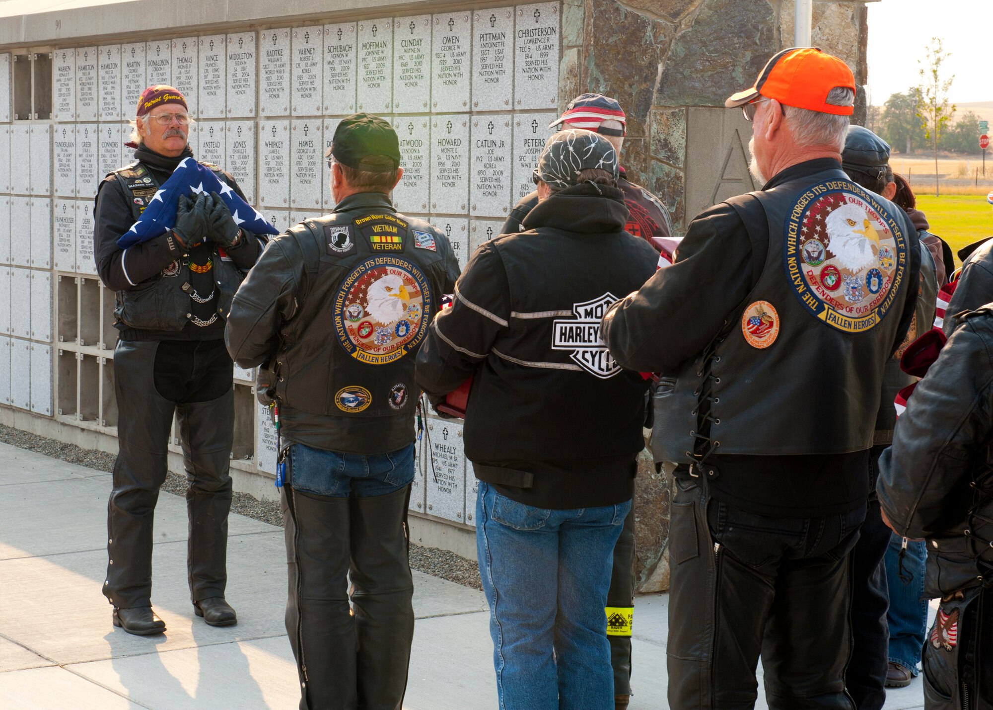 Members of the Patriot Guard Riders escort the unclaimed remains of 20 veterans and one spouse to their final resting place for the Missing in America Project at Washington State Veterans Cemetery in Medical Lake, Wash., Sept. 10, 2012. The MIAP has found over 16,000 remains and identified 2,044 to date. (U.S. Air Force photo by Staff Sgt. Michael Means)