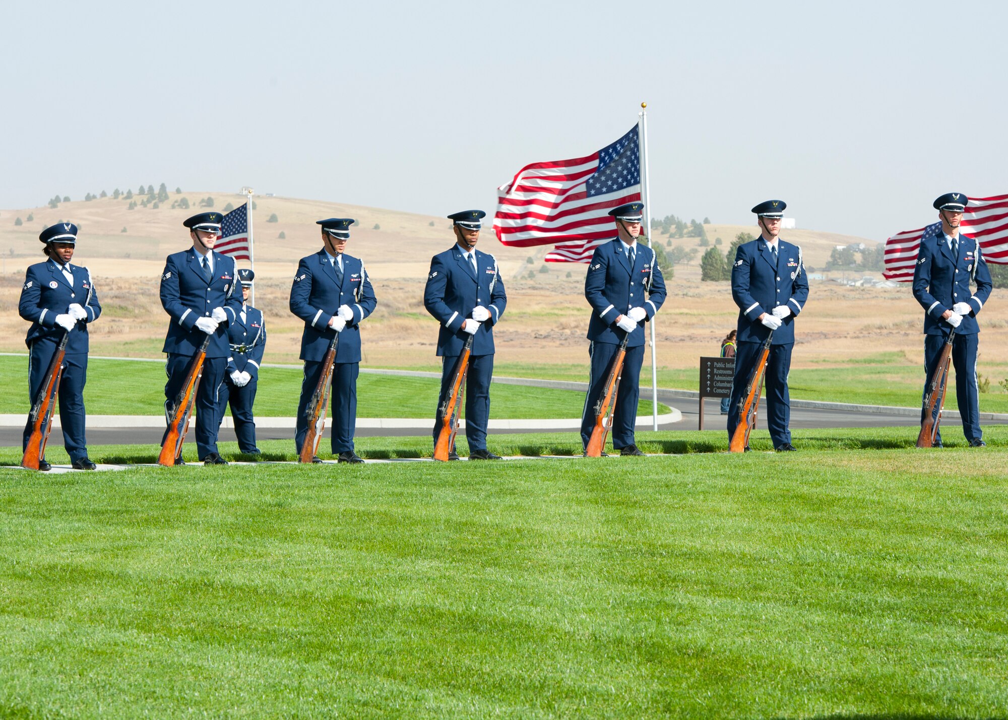 Members of the Fairchild Air Force Base Honor Guard perform military honors for the remains of 20 veterans and one spouse for the Missing in America Project at Washington State Veterans Cemetery in Medical Lake, Wash., Sept. 10, 2012. The honor service included a flag folding, rifle salute and the playing of taps. (U.S. Air Force photo by Staff Sgt. Michael Means)