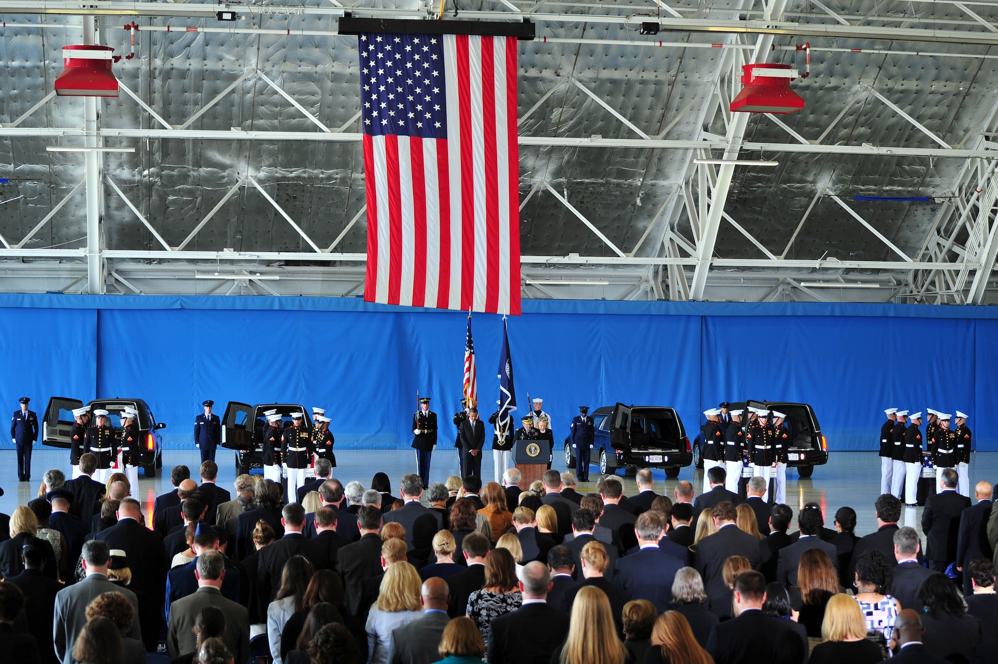 Joint Base Andrews hosts a dignified transfer ceremony Sept. 14 for U.S. Foreign Service members killed during attacks on the U.S. consulate Sept. 11, 2012, in Benghazi, Libya. President of the U.S. Barack Obama and Secretary of State Hillary Rodham Clinton both shared remarks remembering U.S. Ambassador J. Christopher Stevens and State Department members Sean P. Smith, Glen A. Doherty and Tyrone S. Woods. (U.S. Air Force photo by Senior Airman Steele C. G. Britton)