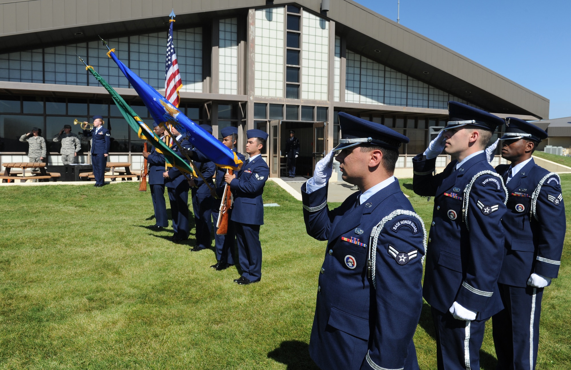 Fairchild Honor Guard instructors salute as they observe a mock full-honors funeral ceremony during the honor guard graduation at Fairchild Air Force Base, Wash., Sept. 13, 2012. (U.S. Air Force photo by Staff Sgt. Michael Means)