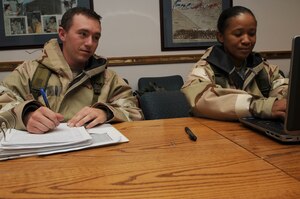 U.S. Air Force Senior Airman Ryan Willis and Staff Sgt. Carla Owens, 366th Fighter Wing knowledge operations managers, man the Unit Control Center during an Operational Readiness Exercise Sep.13, 2012 at Mountain Home Air Force Base, Idaho. In order to make well-informed decisions, commanders in the exercise rely on timely and accurate information from the UCC.