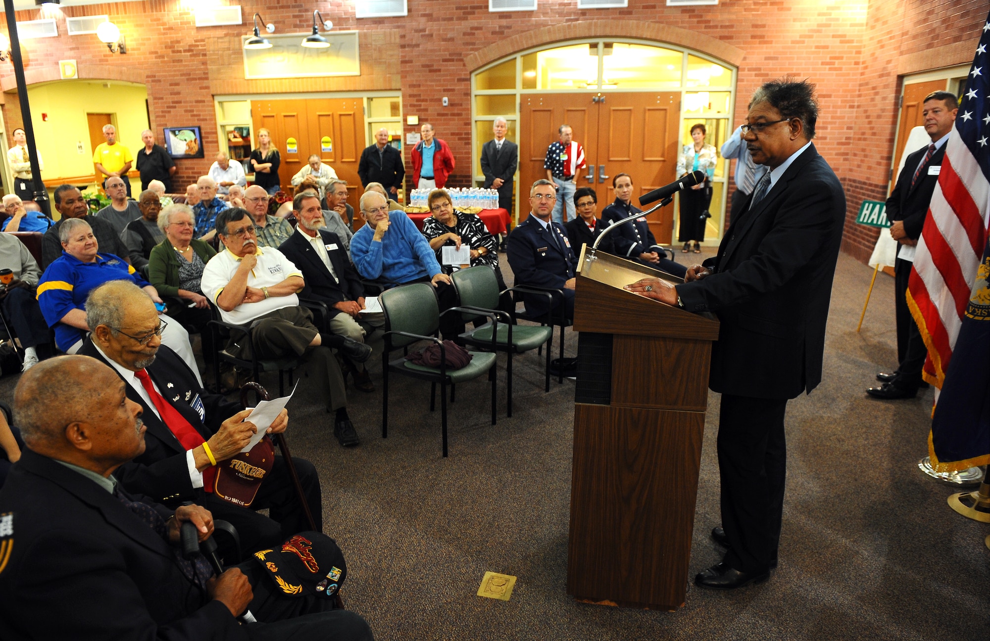 U.S. Air Force Brig. Gen. (retired) Randolph Scott, president of the Alfonzo W. Davis Omaha Chapter for Tuskegee Airmen, provides closing remarks following a road dedication to the late Air Force Lt. Col. Harrison Tull at a formal ceremony held at the Easter Nebraska Veterans Home, Bellevue, Neb., Sept. 13.  Two other Tuskegee Airmen were in attendance to witness the road sign unveiling by Colonel Tull’s daughter and grandson. (U.S. Air Force photo by Josh Plueger/Released)