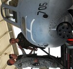 Senior Master Sgt. Brian McNabb, right, maintenance operation center senior controller, 175th Maintenance Operation Flight, discusses the A-10C with Bosnians Maj. Slobodan Simic and Capt. Zeljko Krajina. A group of Bosnian public affairs officers toured Warfield Air National Guard Base in Baltimore, Md. on Friday, September 14, 2012.  (National Guard photo by Tech. Sgt. David Speicher)