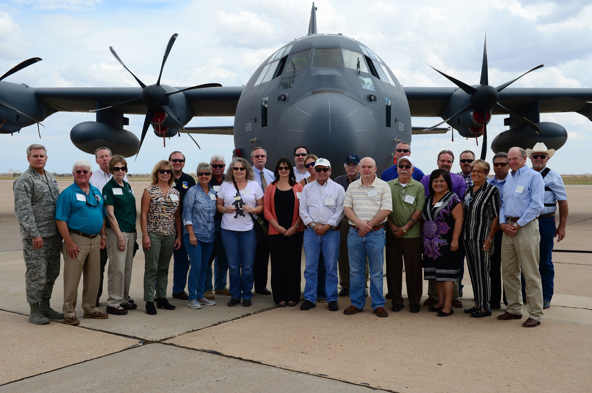 U.S. Air Force Lt. Gen. Eric E. Fiel, Air Force Special Operations Command commander, poses with civic leaders in front of a C-130 J aircraft on the flightline at Cannon Air Force Base, N.M., Sept.12, 2012. Fiel visited Cannon as part of a civic leader tour. (U.S. Air Force photo/Airman 1st Class Eboni Reece)