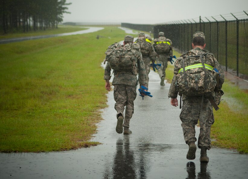 U.S. Air Force Airmen from the 820th Base Defense Group begin a ruck march for Pre-Ranger Focus Training Course at the 820th Base defense squadron Moody Air Force Base Ga., Sep. 5, 2012. The training included patrolling, military operations in urban terrain training and combat water survival training. (U.S. Air Force photo by Airman 1st Class Paul Francis/Released)

