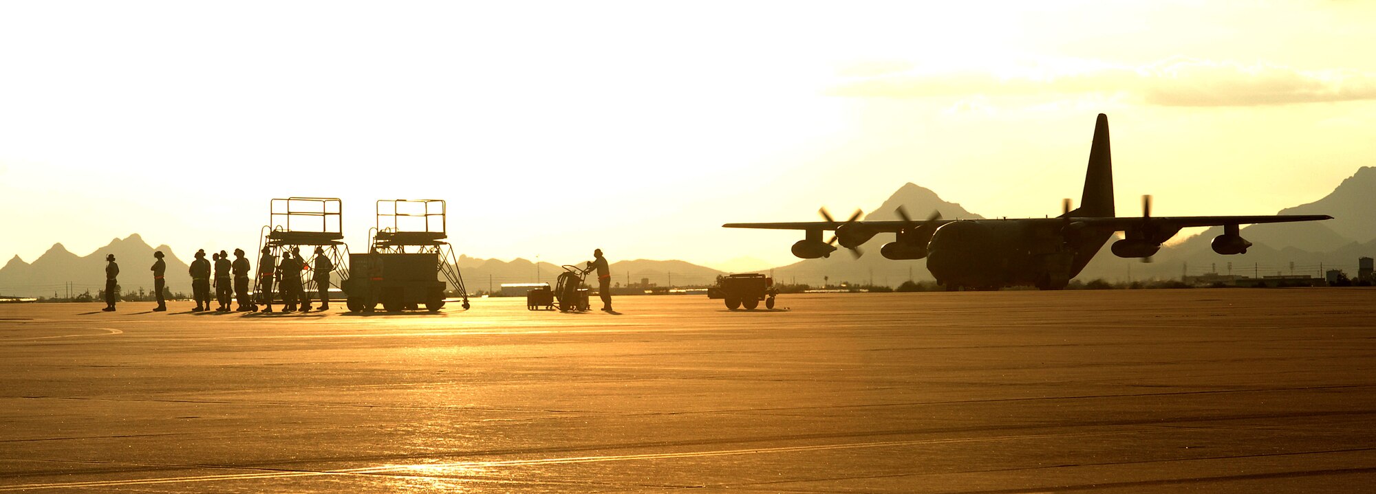 A U.S. Air Force HC-130P taxis down the flightline for the final time at Davis-Monthan Air Force Base, Ariz., Sept. 12, 2012. The crew took the HC-130P out for roughly seven hours of flight. Upon landing, they were greeted by squadron and family members out on the flightline. (U.S. Air Force photo by Airman 1st Class Saphfire Cook)
