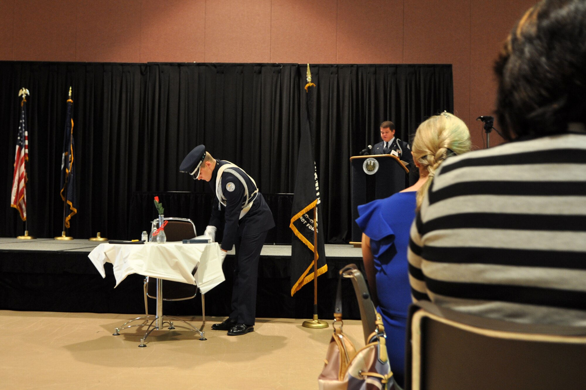 A member of the Benton High School AFJROTC Color Guard performs the POW/MIA Ceremony during the 2012 Patriot Awards Banquet in Bossier City, La., Sept. 11, 2012. Tech. Sgt. Russel Szczepaniec, an explosive ordnance disposal specialist assigned to the 307th Civil Engineer Squadron at Barksdale won the “Military Reserves” category at the banquet.  (U.S. Air Force photo by Master Sgt. Jeff Walston/Released)