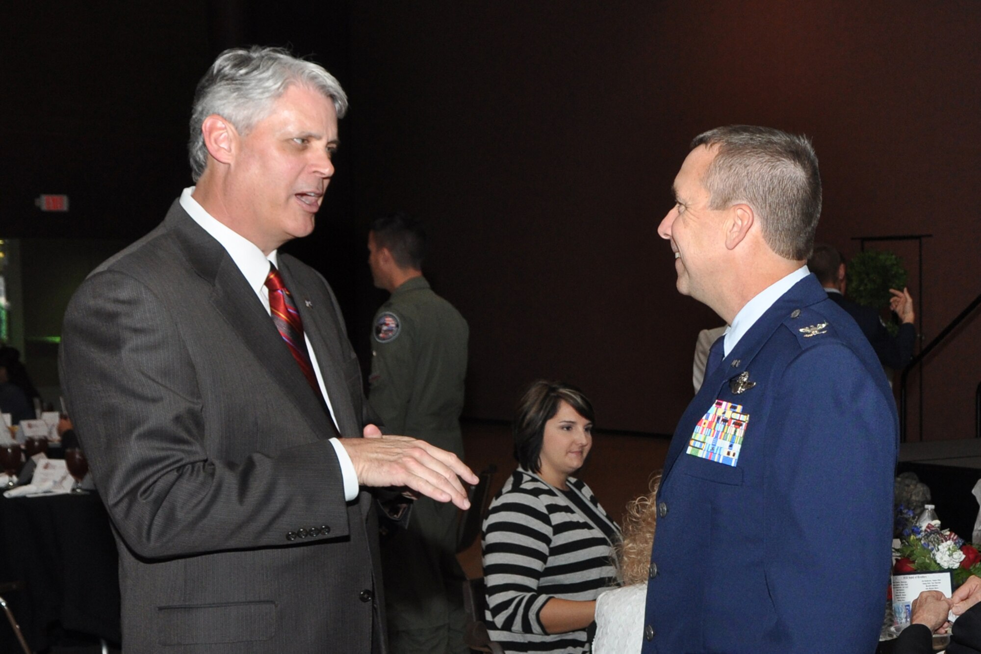Tommie Clark, manager, Government External Affairs for bhpbilliton, speaks with Col. John M. Breazeale, commander, 917th Fighter Group, Barksdale Air Force Base, La., during the 2012 Patriot Awards Banquet in Bossier City, La., Sept. 11, 2012. Breazeale was on hand to support Tech. Sgt. Russel Szczepaniec, an explosive ordnance disposal specialist assigned to the 307th Civil Engineer Squadron at Barksdale who won the “”Military Reserves” category at the banquet.  (U.S. Air Force photo by Master Sgt. Jeff Walston/Released)