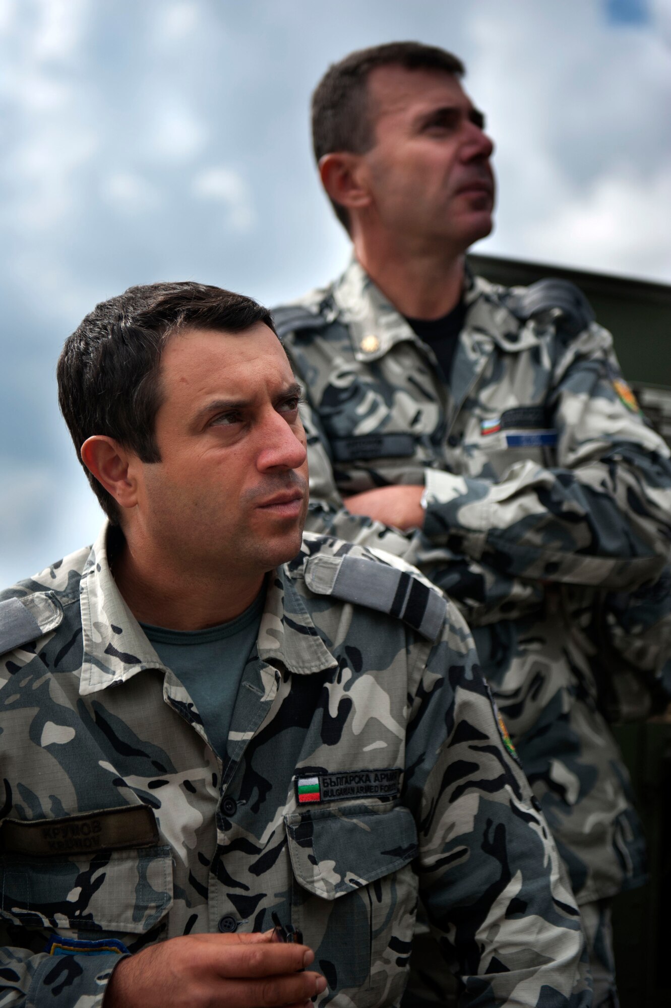 SPANGDAHLEM AIR BASE, Germany – Bulgarian air force Senior Master Sgt. Kalin Krumov, left, and Maj. Iliyan Antonov, overlook the radar operations of the 606th Air Control Squadron Sept. 12 here, during a visit from the Bulgarian air force.  The tour serves as a way for the United States and Bulgaria to learn and exchange ideas about each other’s air force to ensure air dominance in any contingency operation. (U.S. Air Force photo by Airman 1st Class Gustavo Castillo/Released)