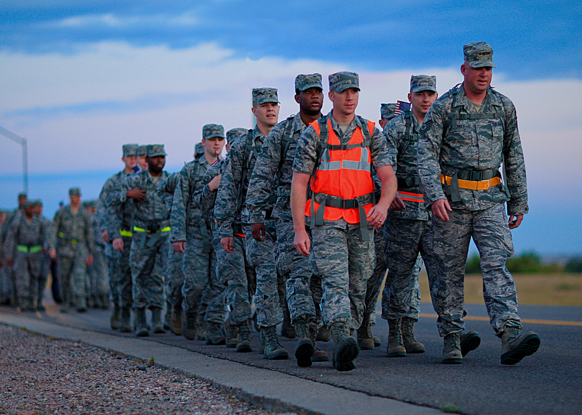 Airmen participate in a Ruck March on F. E. Warren Air Force Base, Wyo., Sept. 11 to commemorate the terrorist attacks of Sept. 11, 2001. Members of the 90th Logistics Readiness Squadron Deployment Distribution Flight held F. E. Warren’s second annual 9/11 Remembrance Ruck March along Warren’s thoroughfares. Approximately 30 Airmen marched, carrying backpacks loaded with 50 pounds of sandbags. Two flights of Airmen left from Building 1270. One flight made an approximately four-mile journey to Gate 1, while the other travelled to Gate 2, on a march covering approximately three miles. (U.S. Air Force photo by Matt Bilden)