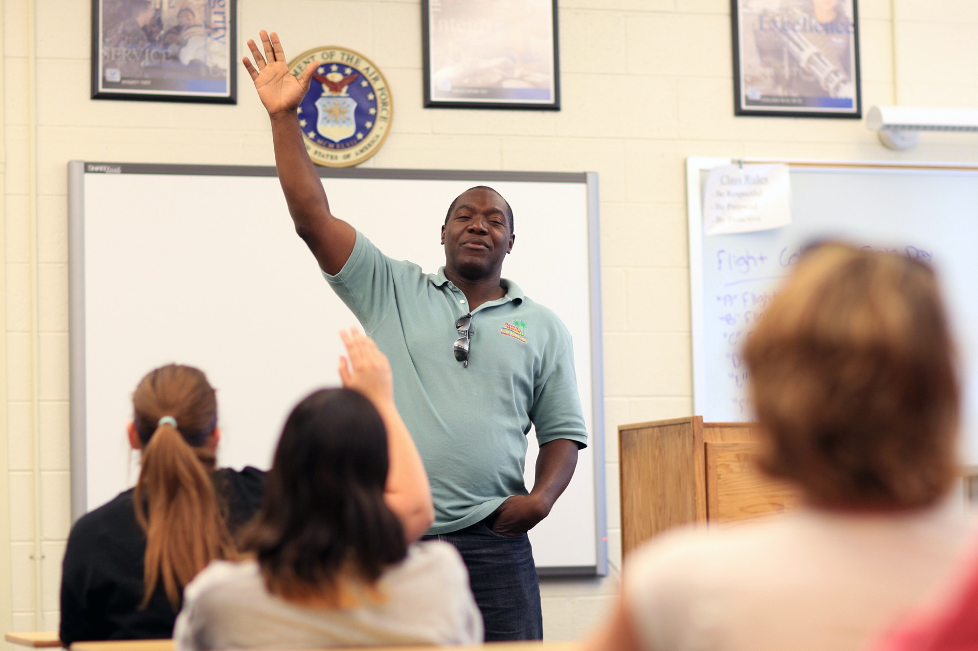 Devon Harris, who, in 1988, became a member of the first Jamaican Olympic bobsledding team, inspiring the Disney movie “Cool Running’s,” speaks to a class of Jr. ROTC students during a visit to East High School in Cheyenne Sept. 7. Devon was taking part in the American300 “Never Quit” series campaign, and  he gave several speeches on and around F. E. Warren Air Force Base, Wyo., Sept. 6 and 7.