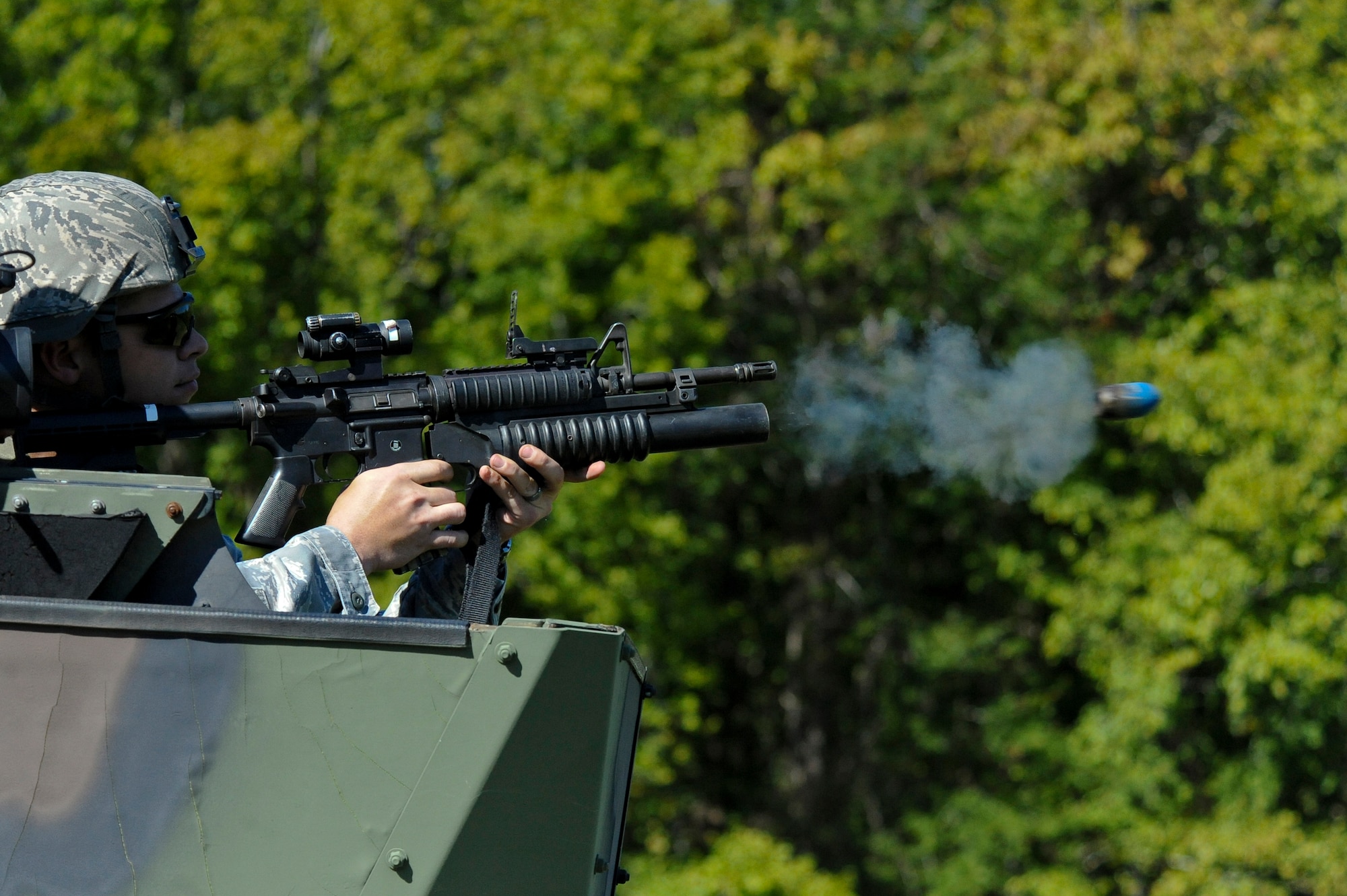 Staff Sgt. James Burton, 2nd Security Forces Squadron, fires an M-203 grenade launcher on Barksdale Air Force Base, La., Sept. 10. Burton practiced firing the M-203 in preparation for the 2012 annual Global Strike Challenge. Each wing in the Air Force Global Strike Command sends a team to represent security forces, maintenance, munitions and operations to compete in the challenge. The competition for security forces begins Sept. 24 and will be held at Camp Guernsey, Wyo. (U.S. Air Force photo/Senior Airman Micaiah Anthony)(RELEASED)