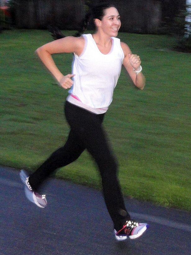 WRIGHT-PATTERSON AIR FORCE BASE, Ohio - Juliet Valenzuela, sister of Tech. Sgt. Joseph Valenzuela, 445th Aeromedical Evacuation Squadron, is training for the 2012 Air Force Marathon scheduled for Sept. 15. Sergeant Valenzuela, Juliet and their sister, Master Sgt. Jackie Duarte, are running in the marathon together. (Courtesy photo)