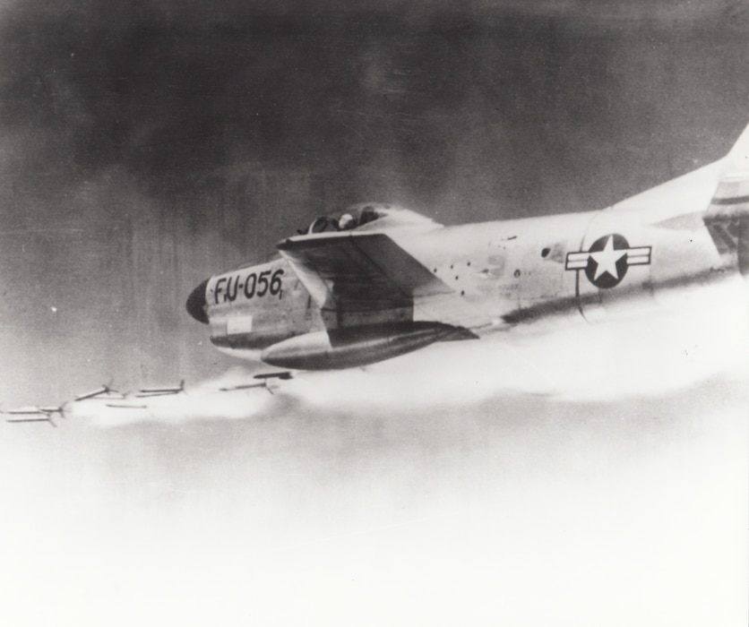 An Air National Guard F-86D/L interceptor fires its 2.75-inch “Mighty Mouse” rockets. Jet fighters closing with jet bombers at over 1,000 miles per hour at night or in bad weather could not count on hitting their target with machine guns, even with the aid of radar and early computers. Before the advent of guided air-to-air missiles, many U.S. interceptor types were armed with unguided rockets fired in large salvos in an effort to increase the probability of a hit.