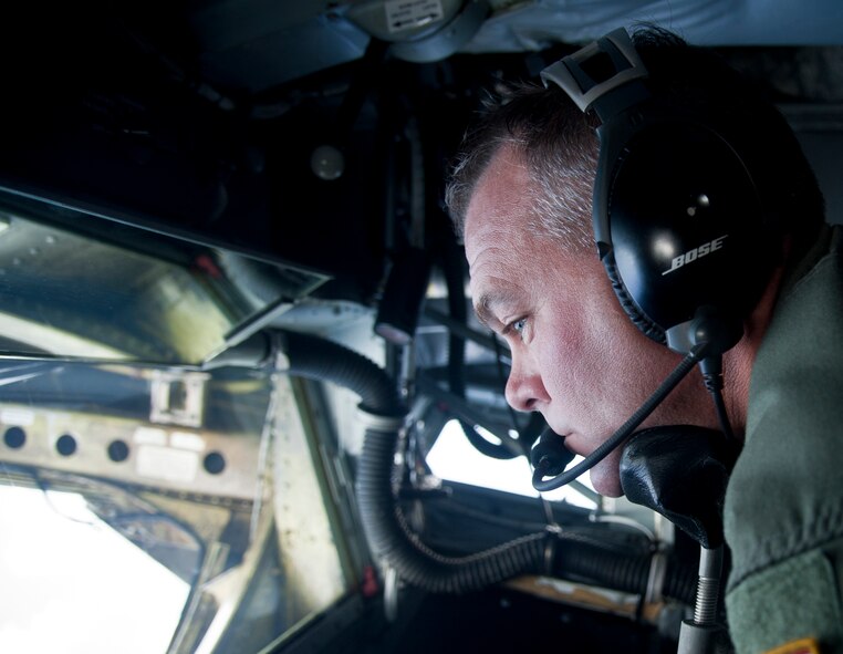 Andersen AFB, Guam --Master Sgt. Jim Doyle, 157th Air Refueling Wing boom operator, guides a drogue to refuel a U.S. Marine Corps F/A-18 Hornet from the Marine Aircraft Group 12 at Marine Corps Air Station Iwakuni, Japan during Valiant Shield 2012 over the Pacific Ocean Sept. 14, 2012. VS12 is a U.S.-only exercise with a focus on integration of joint training among U.S. forces in relation to current operational plans. This training enables real-world proficiency in sustaining joint forces through detecting, locating, tracking and engaging units at sea, in the air, on land and cyberspace in response to a range of mission areas.  (U.S. Air Force photo by Staff Sgt. Alexandre Montes/RELEASED)

