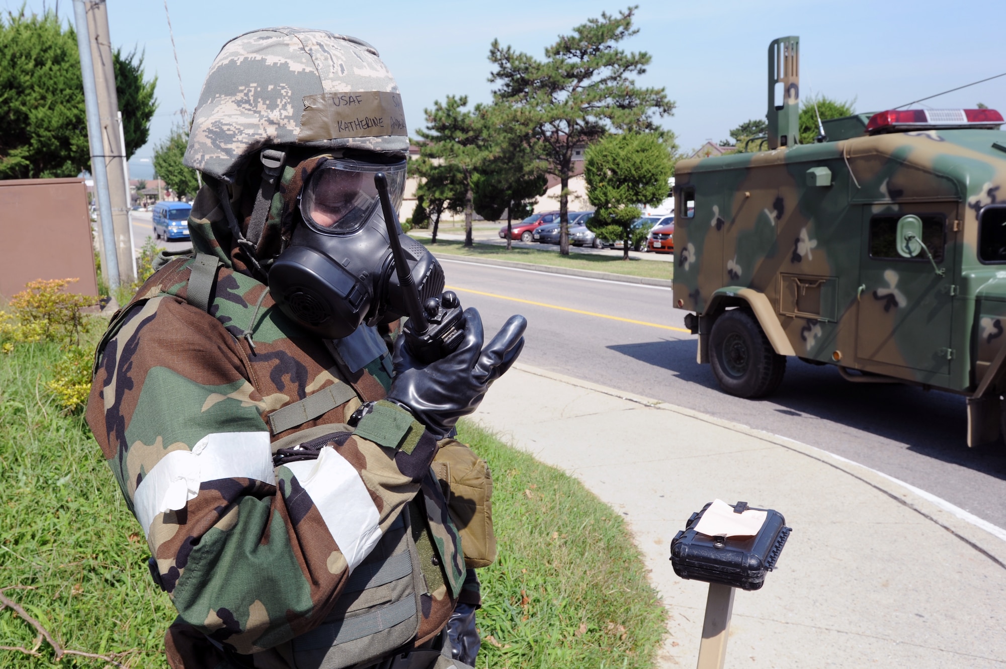 Senior Airman Katherine Anderson, 51st Civil Engineer Squadron Emergency Management journeyman, relays information during a post attack reconnaissance sweep exercise at Osan Air Base, Republic of Korea, Sept. 7, 2012. U.S. Air Force and Republic of Korea Air Force members joined forces to train on responses to chemical, biological, radiological, nuclear, and high yield attacks. (U.S. Air Force photo/Airman 1st Class Alexis Siekert)

