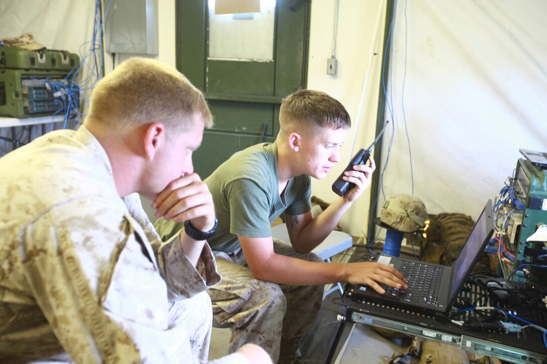 Marines with Communications Company, Combat Logistics Regiment 27 test the network and communication lines during a field exercise aboard Camp Lejeune, N.C., Sept. 11, 2012. Marines with Comm. Co. conducted a week-long field exercise to assess their capabilities of having a tactical network that is used when Marines deploy abroad.