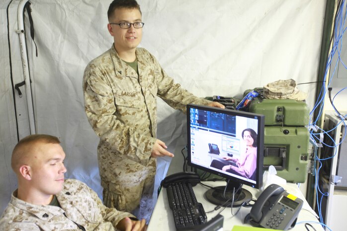 Marines with Communications Company, Combat Logistics Regiment 27 explain how servers allow the computers to perform tasks during a field exercise aboard Camp Lejeune, N.C., Sept. 11, 2012. Marines with Comm. Co. conducted a week-long field exercise to assess their capabilities of having a tactical network that is used when Marines deploy abroad. 