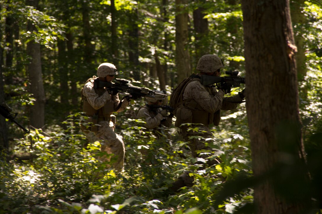 Marines with 2nd Squad, 2nd Platoon, Company K, Battalion Landing Team (BLT) 3/2, 26th Marine Expeditionary Unit (MEU), run a squad assault course at Fort Pickett, Va., Sept. 11, 2012. This training is part of the 26th MEU's pre-deployment training program. BLT 3/2 is one of the three reinforcements of 26th MEU, which is slated to deploy in 2013.