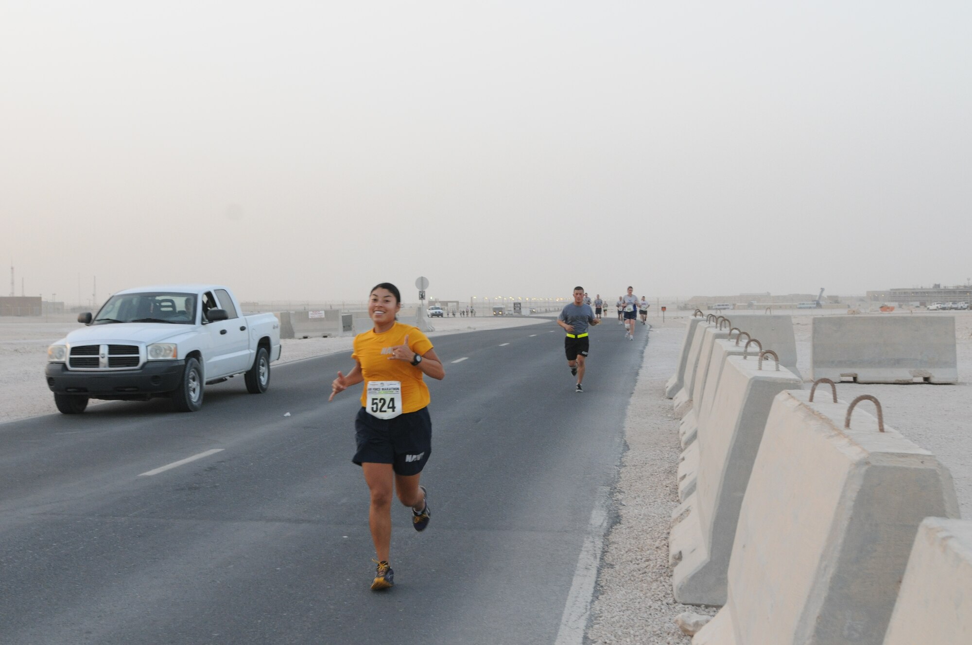 Service members from the Air Force, Army, Navy, Marines and Coalition
Partners participated in a satellite Air Force 10k and Half Marathon, held at
the 379th Air Expeditionary Wing in Southwest Asia, Sept. 15, 2012.  The
race was held to provide deployed service members an opportunity to remotely
participate in the sold out Air Force Marathon held at Wright-Patterson Air
Force Base, Ohio.  More than 500 people participated in the race held here. (U.S. Air Force photo/Captain Craig Carper)
