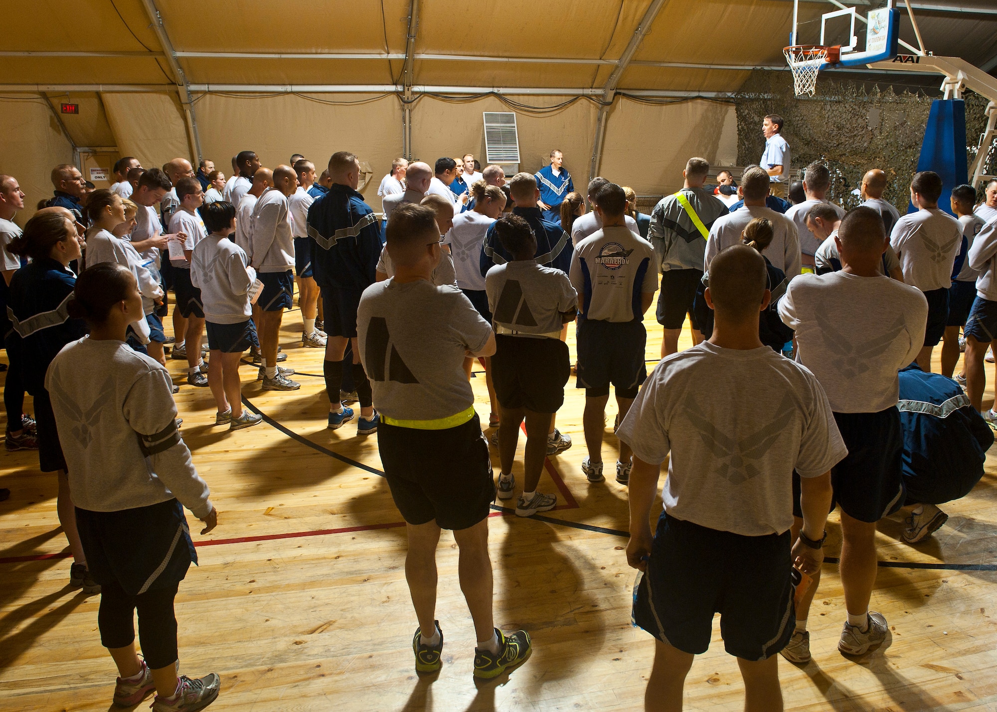 Participants receive a runner's brief before the Air Force Marathon at the Transit Center at Manas, Kyrgyzstan, Sept. 15, 2012. More than 150 participants from the Transit Center and Manas International Airport ran in the 10k, half- and full marathon races. (U.S. Air Force photo/Senior Airman Brett Clashman)