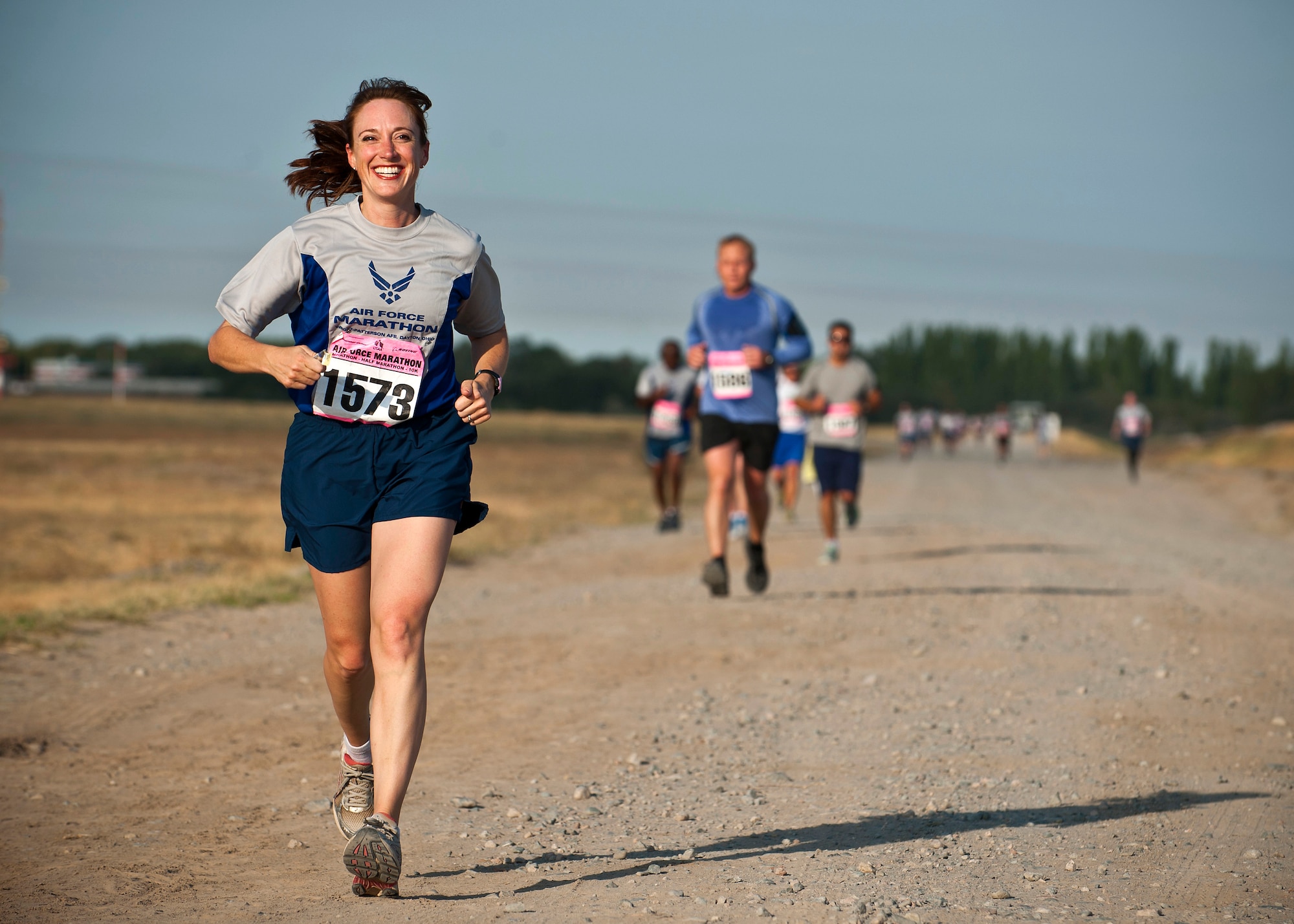 Maj. Cynthia Kearley runs during the Air Force Marathon at the Transit Center at Manas, Kyrgyzstan, Sept. 15, 2012. The participants were able to run a 10k, half- or full marathon race. Kearley is the 376th Air Expeditionary Wing staff judge advocate deployed from Maxwell Air Force Base, Ala. and a native of Tampa, Fla. (U.S. Air Force photo/Senior Airman Brett Clashman)