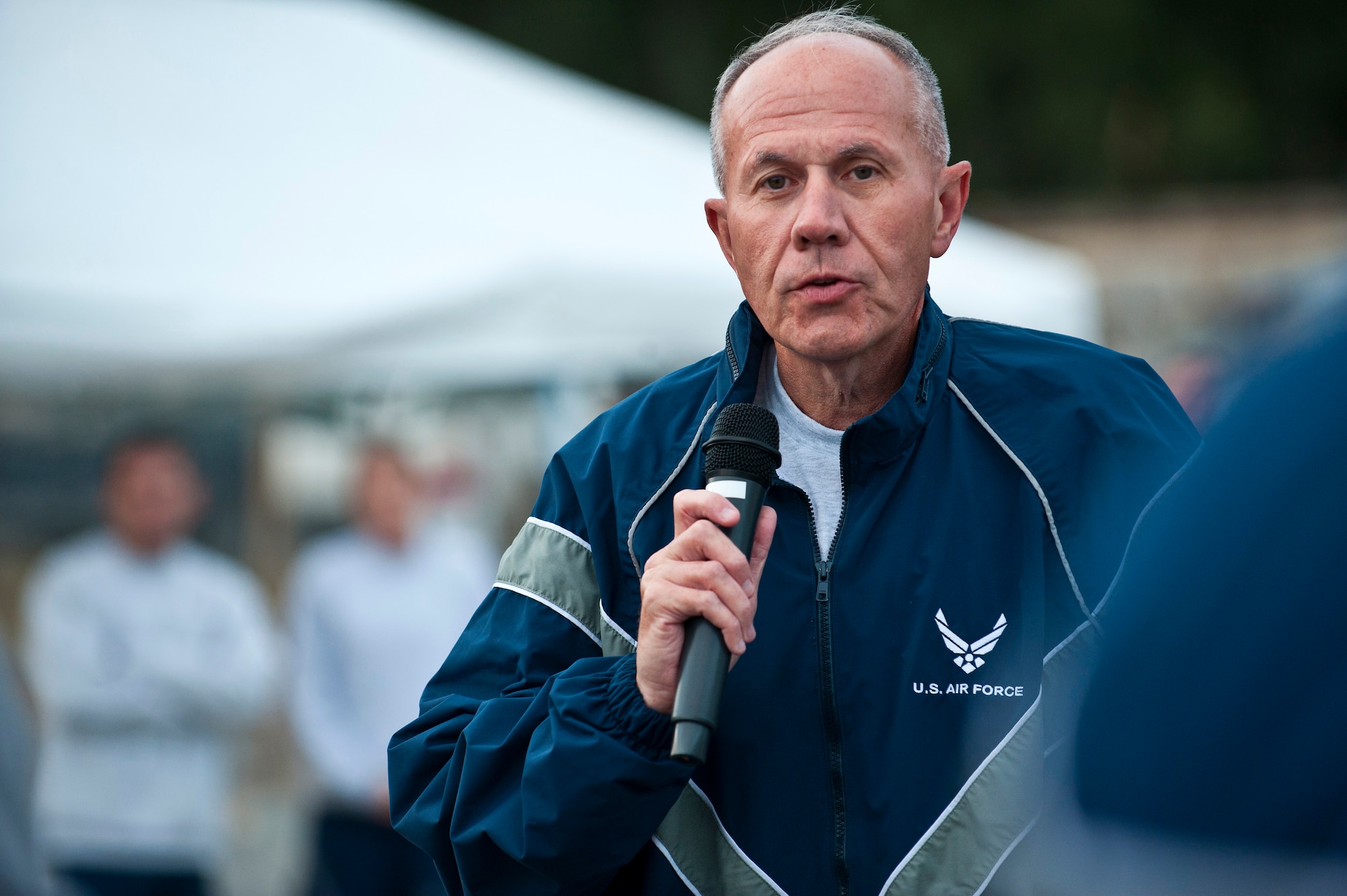 Chaplain (Lt. Col.) Larry Layne delivers an invocation before the start of the Air Force Marathon at the Transit Center at Manas, Kyrgyzstan, Sept. 15, 2012. He is deployed from the Alabama Air National Guard and is a native of Montgomery, Ala. (U.S. Air Force photo/Senior Airman Brett Clashman)