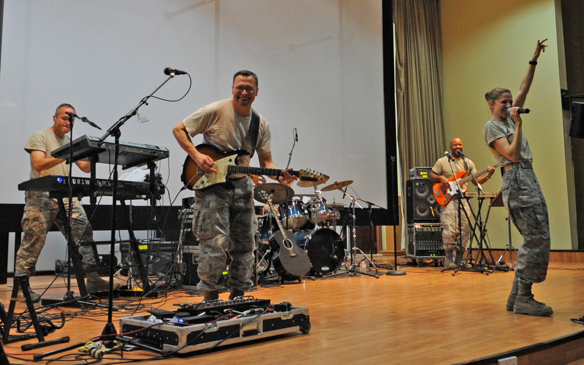 SOUTHWEST ASIA – The U.S. Air Forces Central Band performs for the 386th Air Expeditionary Wing Airmen at the Rock Theater Sept. 8. This is Top Flight’s first stop of many throughout the area of responsibility. These dynamic musicians perform and tour in small ensembles throughout the AOR to positively promote troop morale, diplomacy and outreach to host nation communities. (U.S. Air Force photo/Staff Sgt. Alexandra M. Boutte)