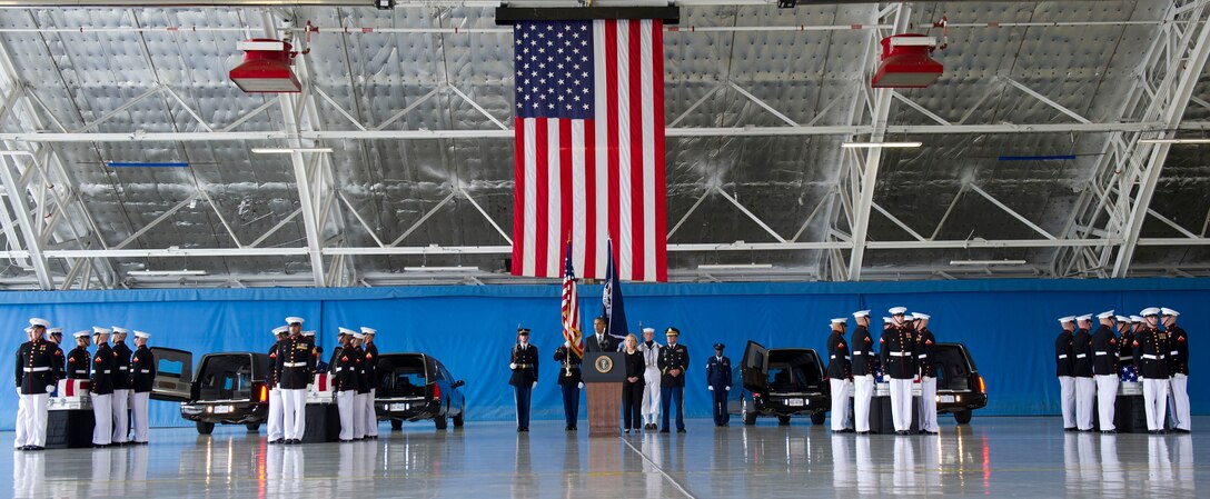 President Barack Obama speaks at the dignified transfer ceremony for the U.S. Ambassador to Libya J. Christopher Stevens, Foreign Service officer Sean Smith, and security officers Tyrone S. Woods and Glen A. Doherty on Joint Base Andrews, Md., Sept. 14, 2012.