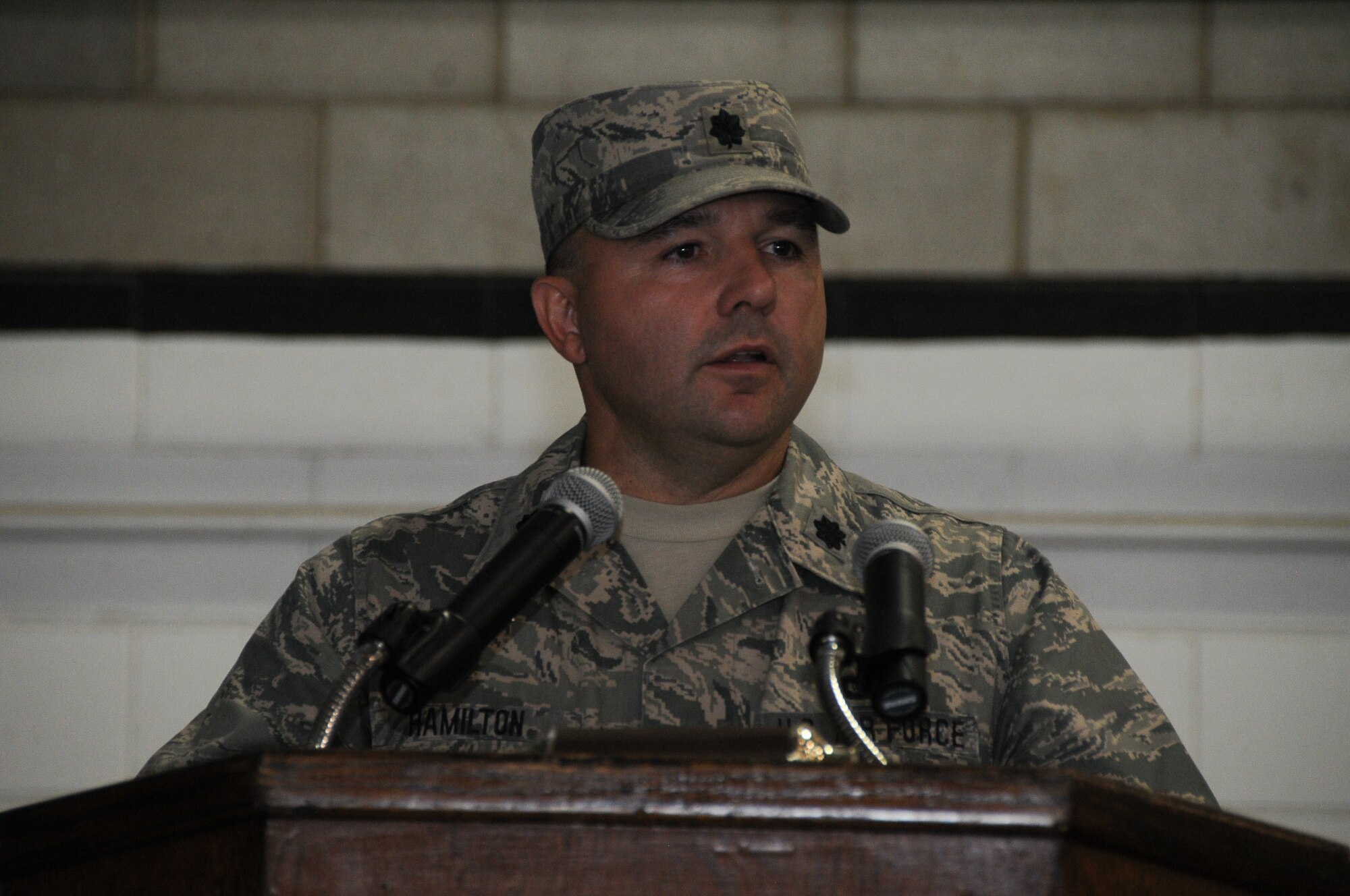 Lt. Col. Christopher Hamilton addresses the crowd during his change of command ceremony at Otis Air National Guard Base, Mass., Sept. 15, 2012. Hamilton assumed command of the 102nd Mission Support Group. His previous assignment was 102nd Security Forces Squadron commander. (Air National Guard photo by Senior Airman Patrick McKenna/Released)