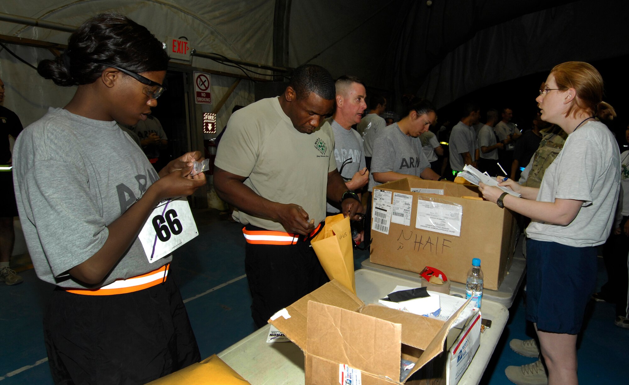 Personnel at Bagram Airfield, Afghanistan, register for the U. S. Air Force Marathon (Bagram) Sept. 15, 2012. More than 500 people registered to run.  Runners chose from four distances; the full-marathon, the half-marathon, a ten-kilometer run, or a five-kilometer run. Bagram was one of seven deployed locations throughout the area of responsibility that participated in the Marathon. (U.S. Air Force photo/SSgt Jeff Nevison)
