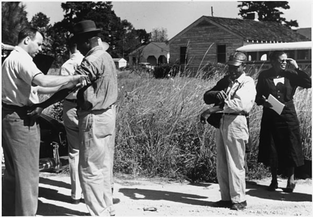 African American males are tested and treated during the Tuskegee Study of Untreated Syphilis in the Negro Male. According to the Centers for Disease Control and Prevention, the study began in 1932 as U.S. Public Health Service medical personnel conducted these tests without the benefit of patients’ informed consent. (Courtesy photo from the Centers for Disease Control and Prevention/Released)