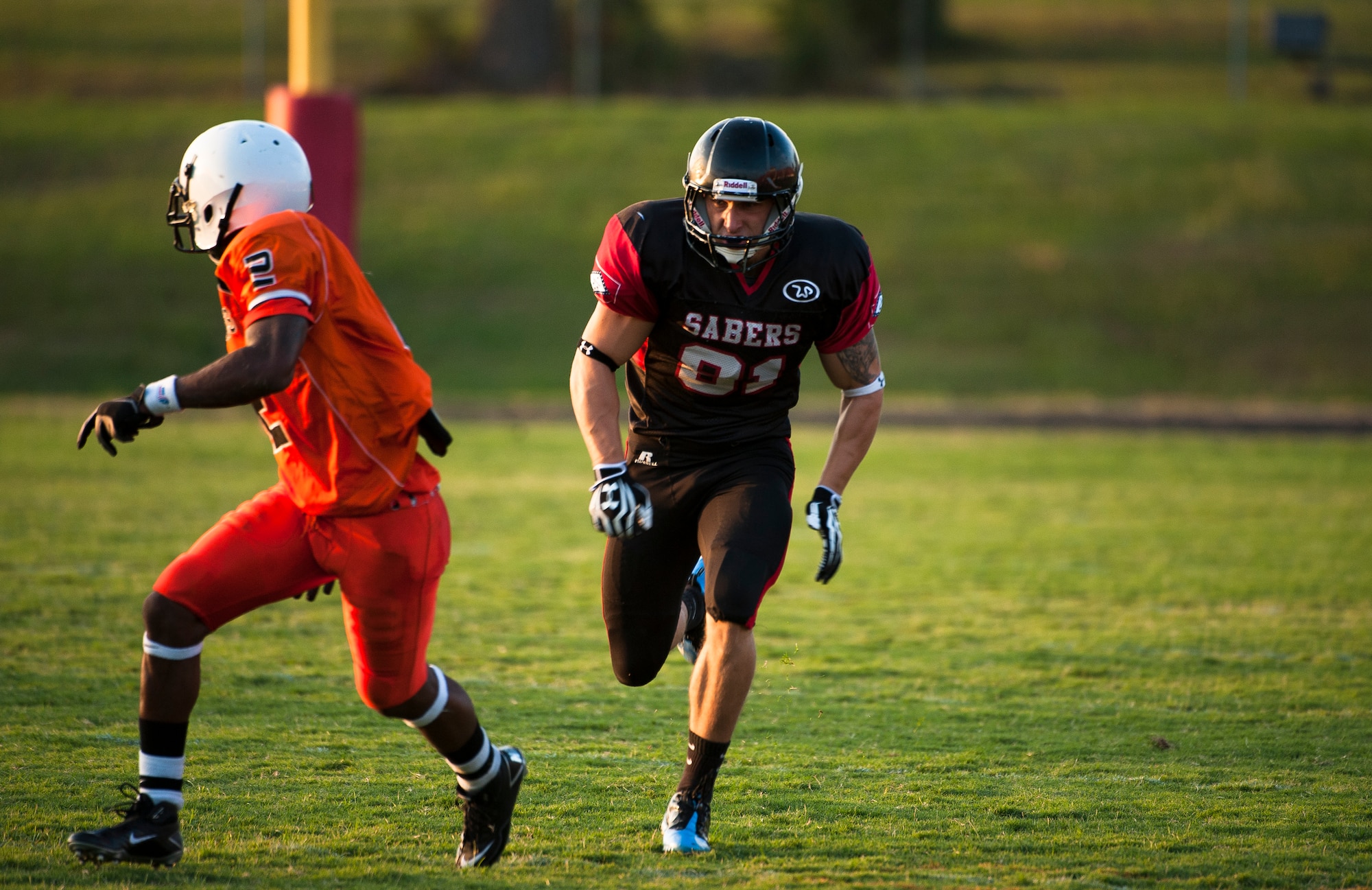 Airman 1st Class Danny Bise runs a route during an Arkansas Sabers game Aug. 25, 2012, at Jacksonville High School, Ark. Bise plays wide receiver for the team during his off duty time.    (U.S. Air Force photo by Staff Sgt. Russ Scalf)