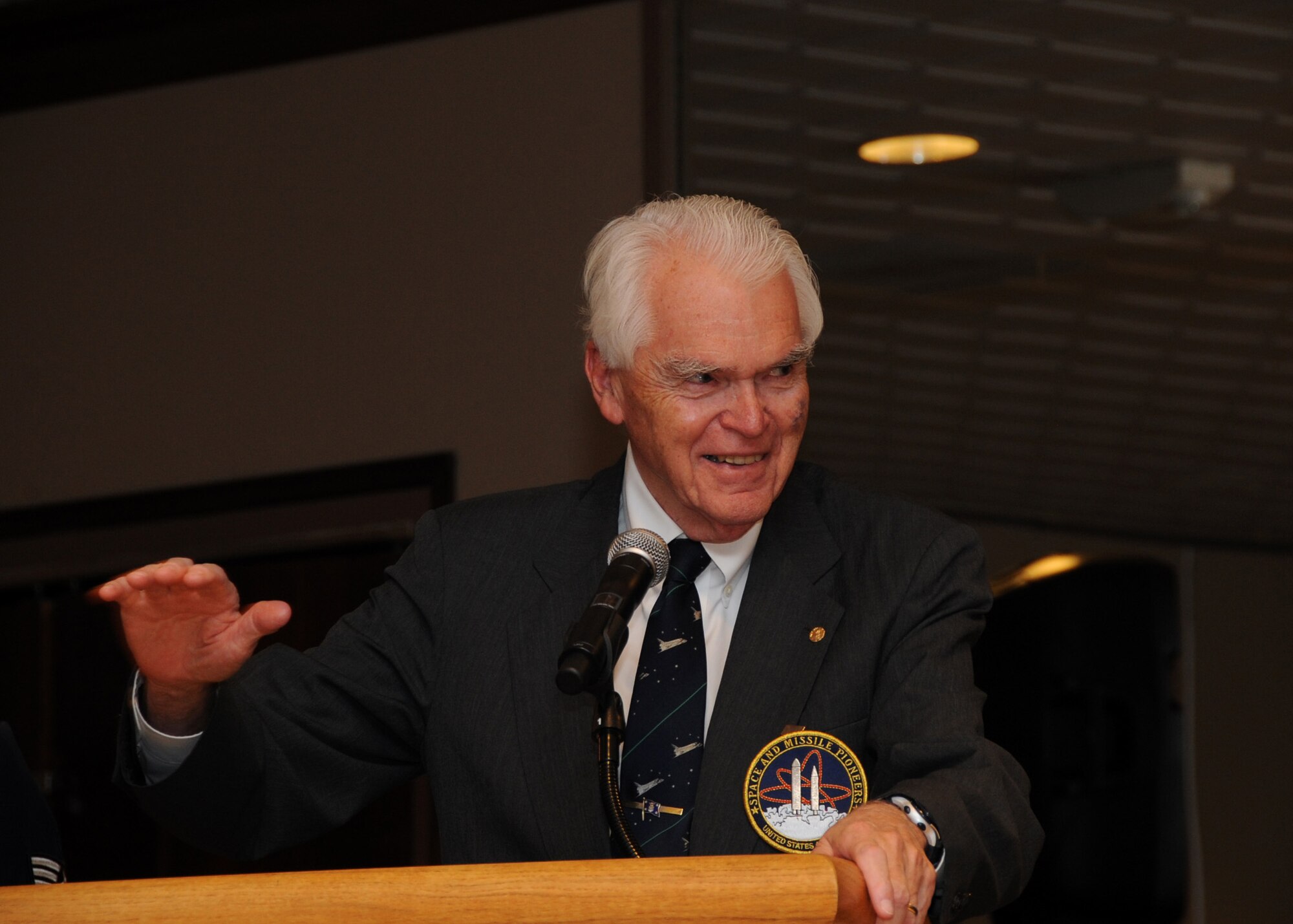 Air Force Space Command's 2012 air Force Space and Missile Pioneers award recipient Dr. Hans M. Mark addresses the audience after his induction at Peterson AFB, Colo., Sept. 14.  The Air Force Space and Missile Pioneer Award recognizes individuals who played a significant role in the history of Air Force space and missile programs, educates Air Force Space Command personnel, Air Force personnel, other DoD members, and the general public about the contributions of significant figures in Air Force space and missile history, generates interest in the study of Air Force space and missile history, and encourages Air Force Space Command and other Air Force personnel to appreciate and understand their space and missile heritage.