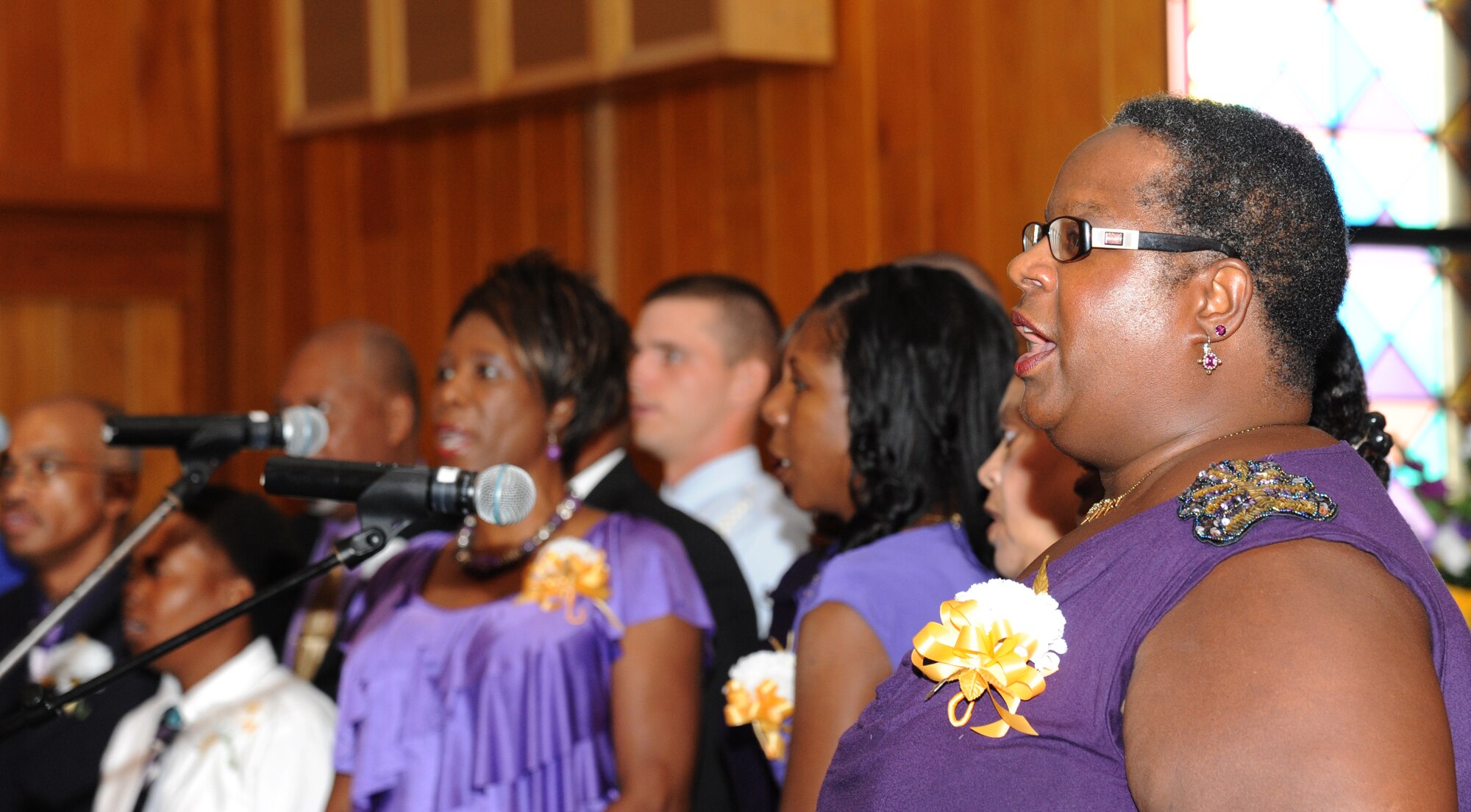 The Keesler Air Force Base Mass Choir sings “Great is Thy Faithfulness” during the 41st Gospel Service Anniversary celebration Sept. 16, 2012, at the Triangle Chapel, Keesler AFB, Miss.  (U.S. Air Force photo by Kemberly Groue)