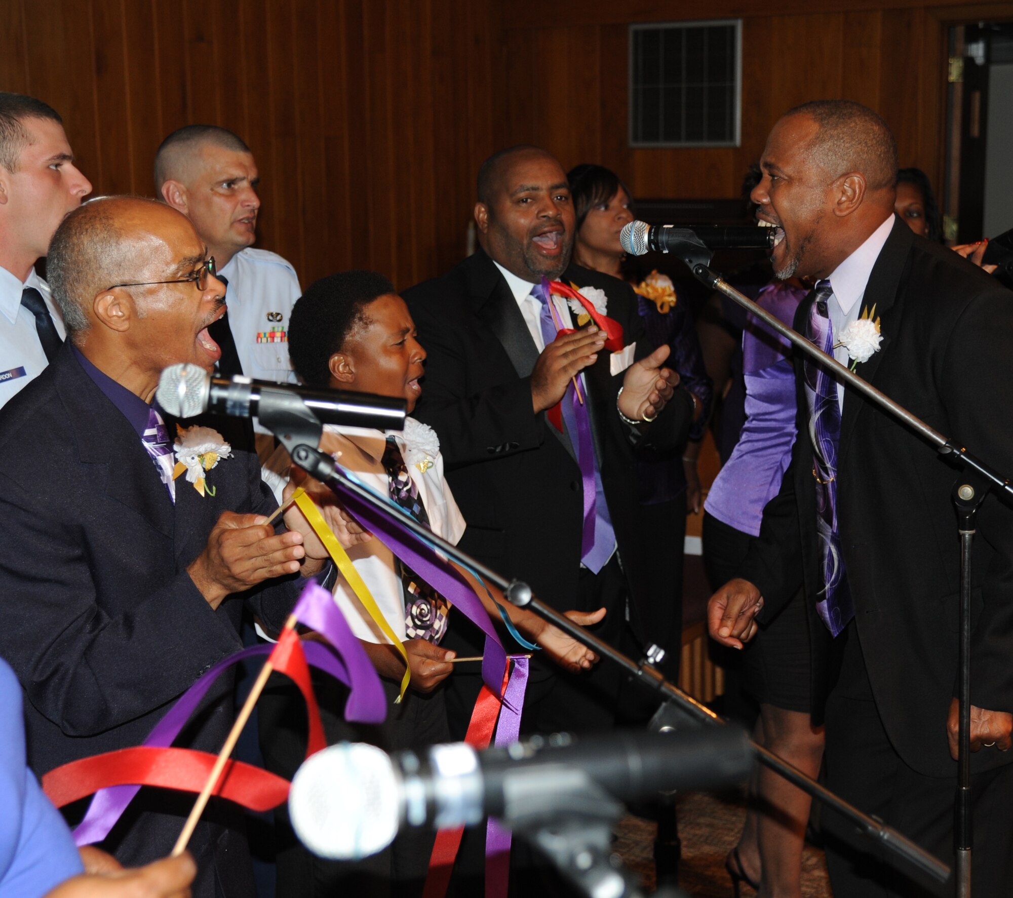 The Keesler Air Force Base Mass Choir sing “Great is Thy Faithfulness” during the 41st Gospel Service Anniversary celebration Sept. 16, 2012, at the Triangle Chapel, Keesler AFB, Miss.  (U.S. Air Force photo by Kemberly Groue)