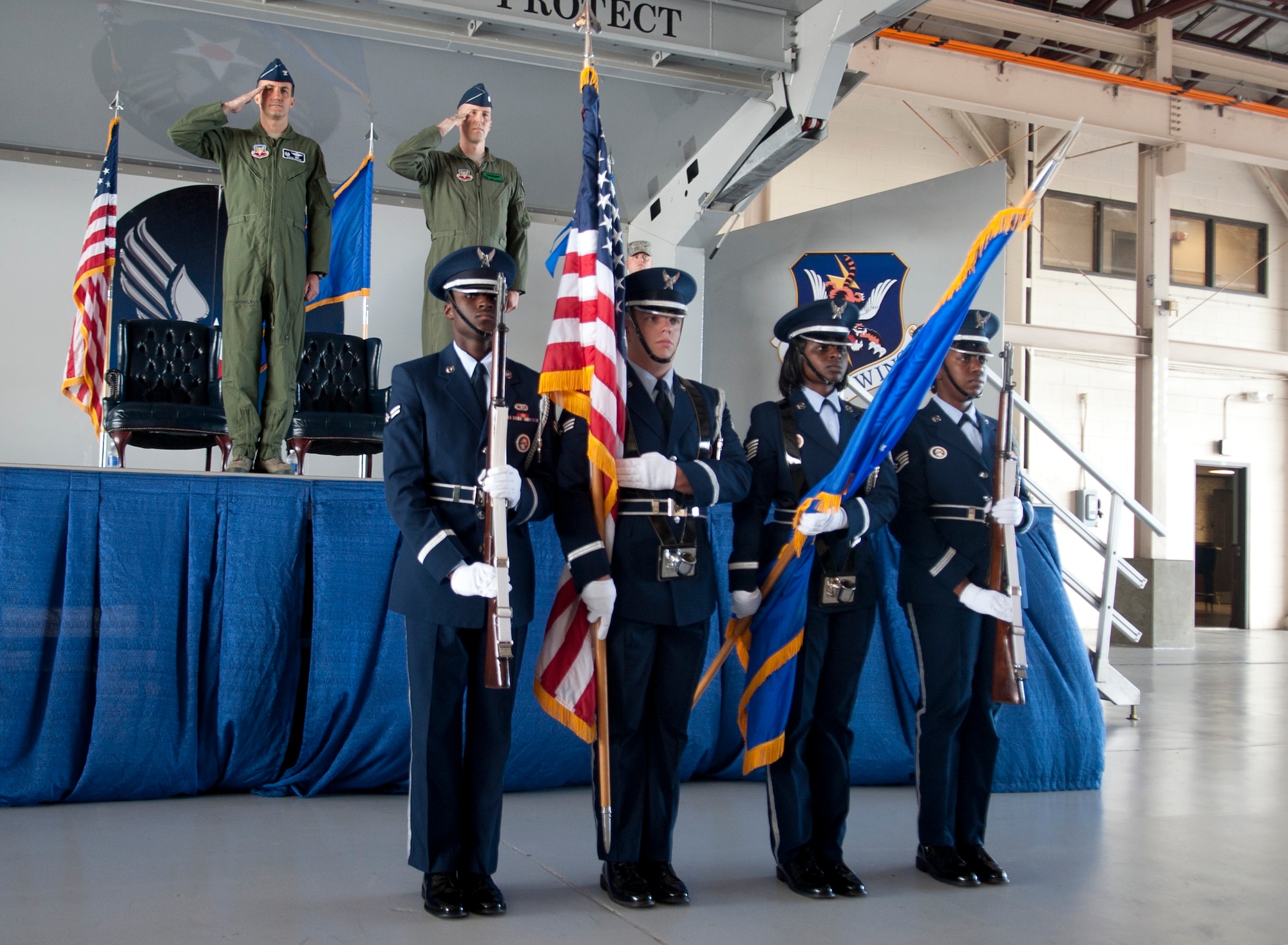 The Moody Air Force Base Honor Guard presents the colors during the 41st Rescue Squadron assumption of command at Moody Air Force Base, Ga., Sep. 14, 2012. During the ceremony, U.S. Air Force Lt. Col. Shawn Cochran assumed command of the 41st Rescue Squadron. (U.S. Air Force photo by Airman 1st Class Paul Francis/Released) 
