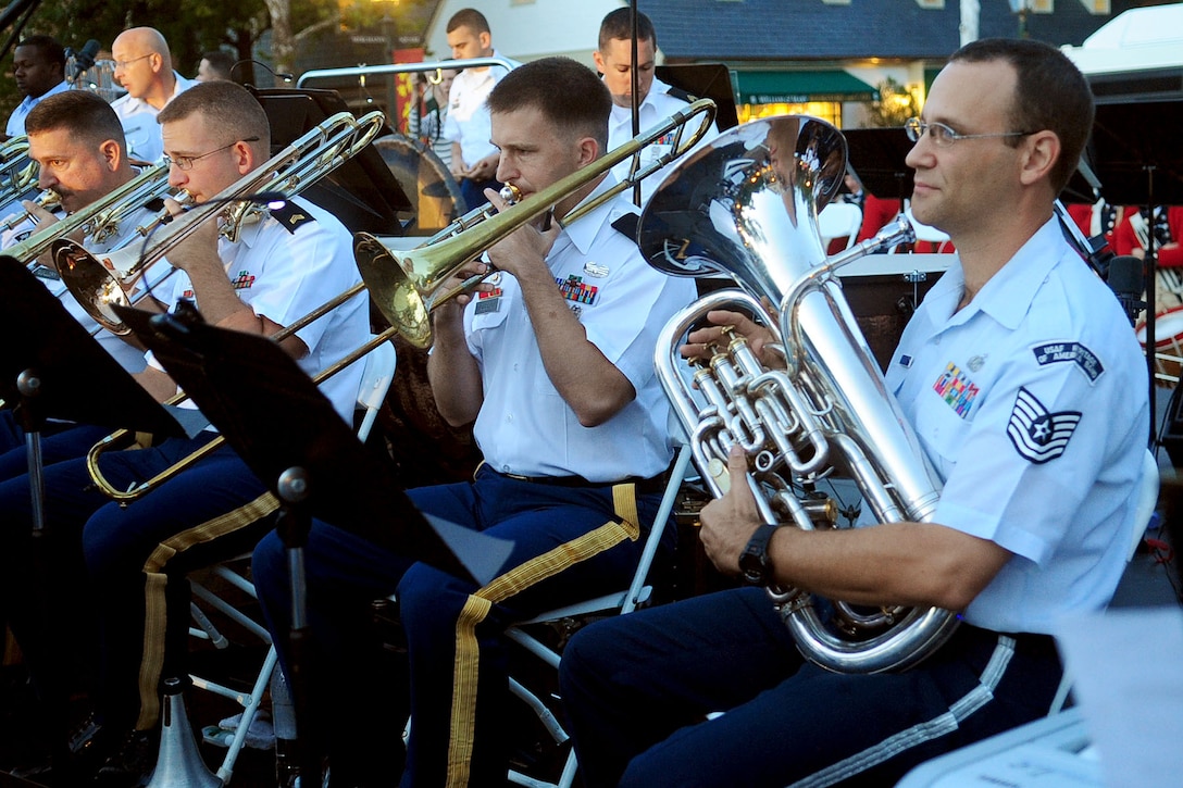 Members of the U.S. Air Force Heritage of America and U.S. Army Training and Doctrine Command bands perform during the fourth annual Constitution Day ceremony in Williamsburg, Va., Sept. 15, 2012. This year marked the fourth year the AFHOA Band performed in the show, and the second year of joining forces with TRADOC. (U.S. Air Force photo by Staff Sgt. Ashley Hawkins/Released)