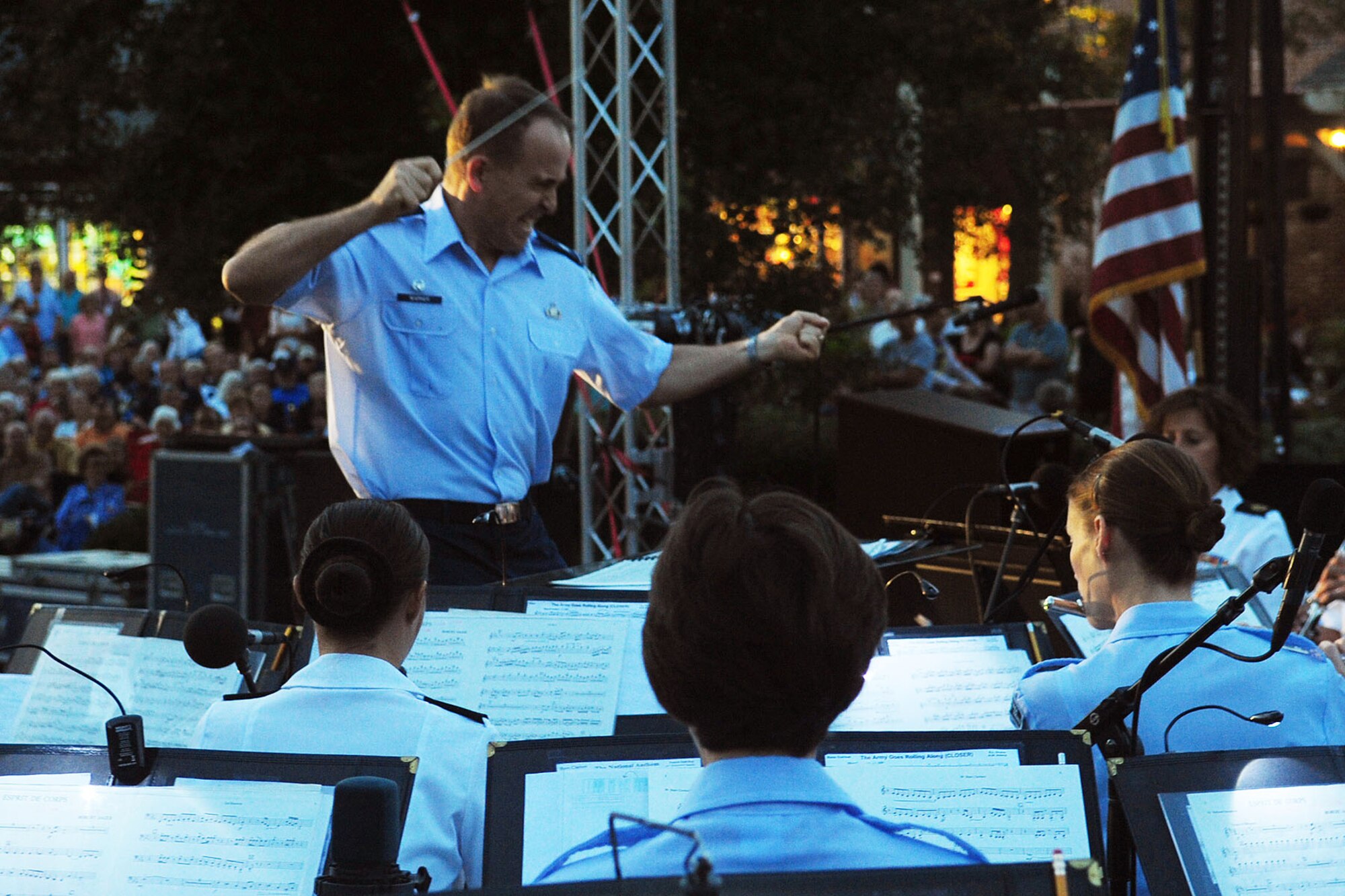 U.S. Air Force Lt. Col. Jeff Warner, Air Force Heritage of America Band commander, conducts the AFHOA and U.S. Army Training and Doctrine Command bands during the annual Constitution Day celebration in Williamsburg, Va., Sept. 15, 2012. Approximately 50 performers in their respective service dress uniforms performed patriotic classics in honor of Constitution Day. (U.S. Air Force photo by Staff Sgt. Ashley Hawkins/Released)