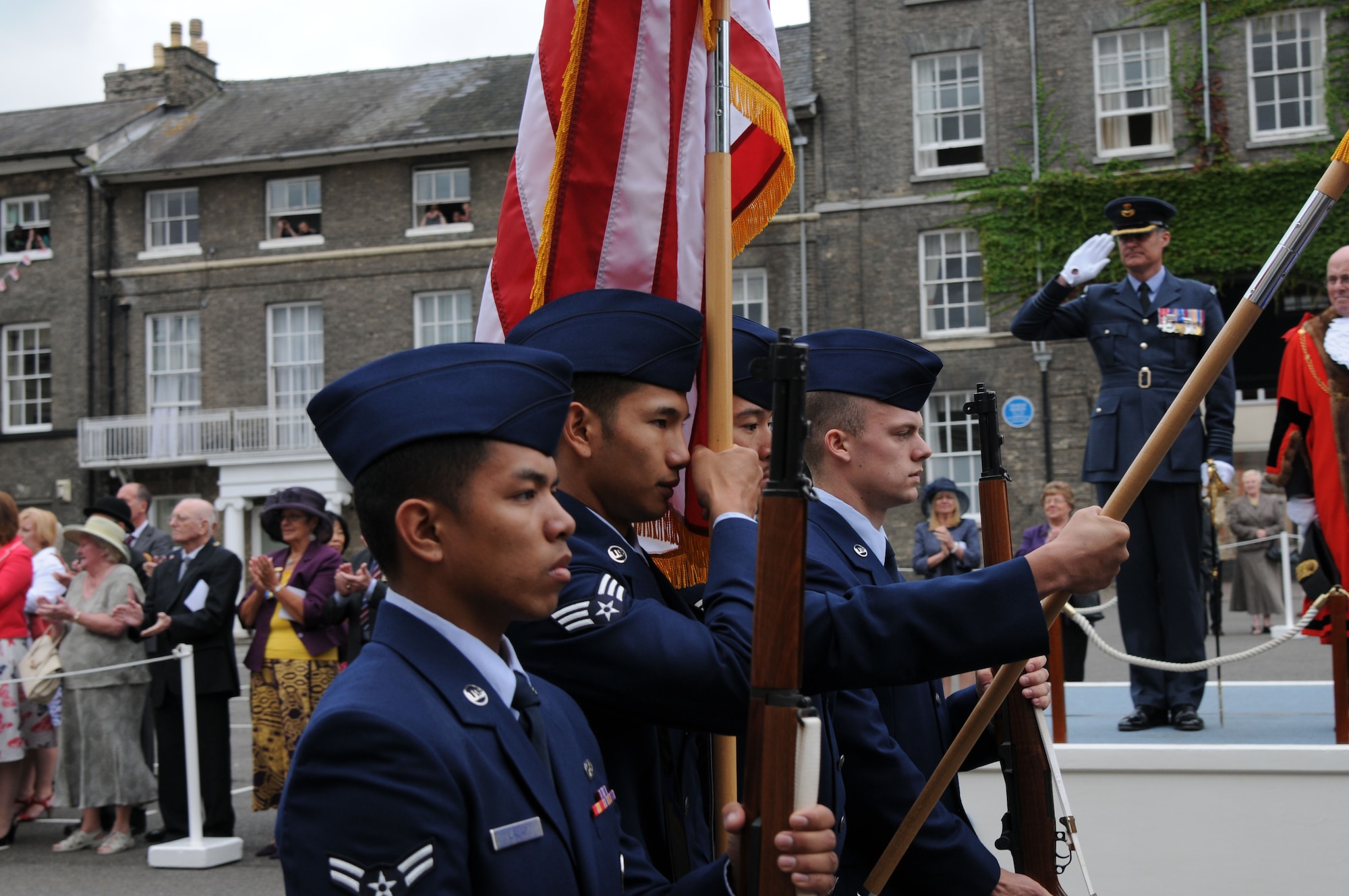 RAF MILDENHALL, England –The RAF Mildenhall Honor Guard marches past Grp. Capt. Andrew Hall, Station Commander of RAF Honington, during the Battle of Britain Commemoration Parade in Bury St. Edmunds, England, Sept. 16, 2012. Hall saluted each unit that marched in the parade as they passed. (U.S. Air Force photo/Airman 1st Class Kelsey Waters) 