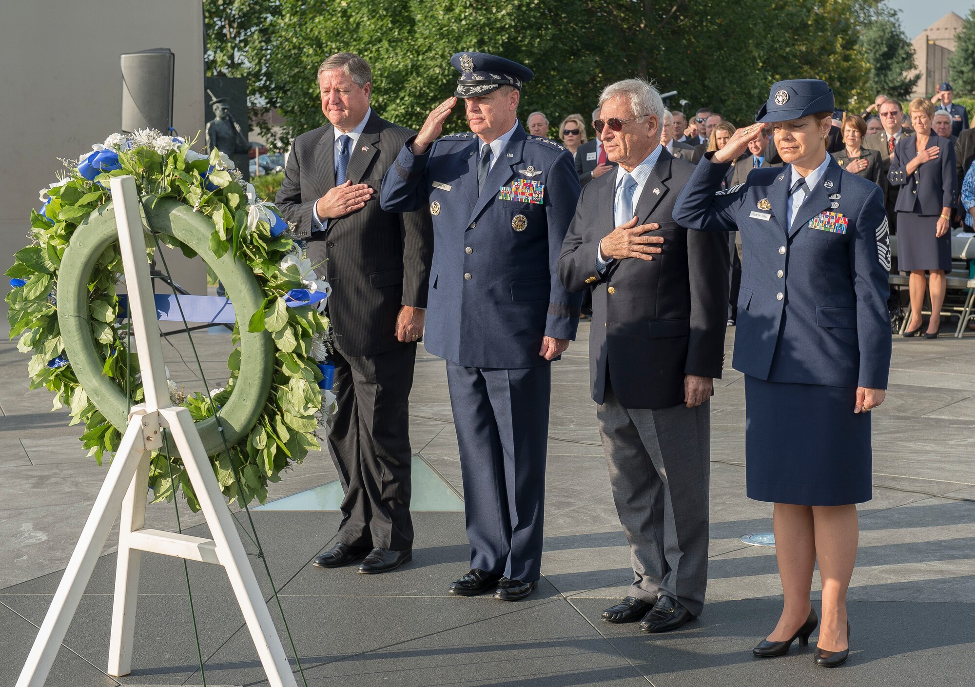 From the left: Secretary of the Air Force Michael Donley, Air Force Chief of Staff Gen. Mark A. Welsh III, Air Force Association Chairman of the Board S.Sanford Schlitt and the Senior Enlisted Leader to the Chief, National Guard Bureau Chief Master Sgt.  Denise Jelinski-Hall render honors during a wreath laying ceremony commemorating this year’s fallen AFA members at the Air Force Memorial in Arlington, Va., Sept. 16, 2012. (U.S. Air Force photo/Jim Varhegyi)