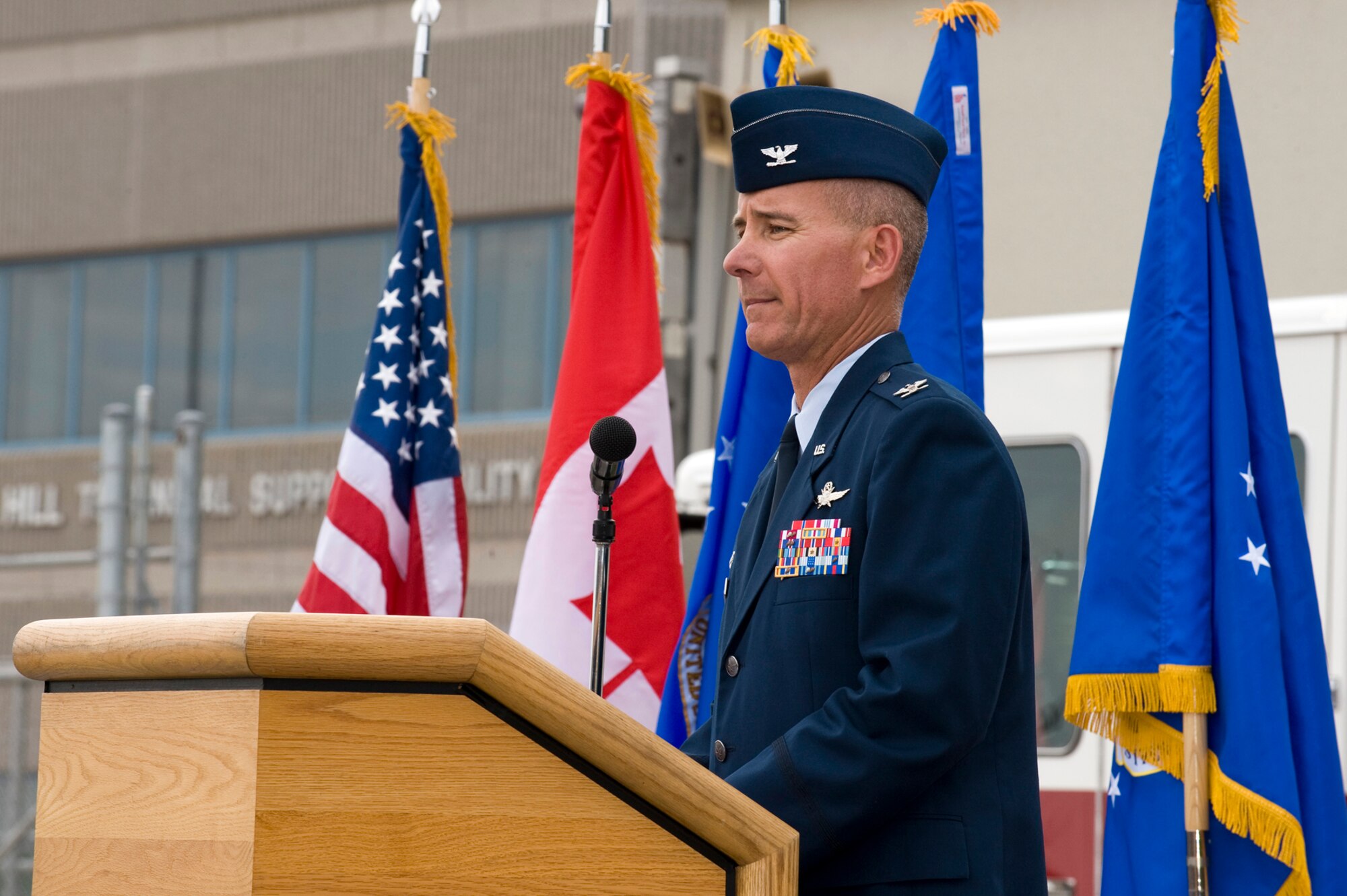 Col. Joe Turk, Cheyenne Mountain Air Force Station installation commander, speaks during the 9/11 Remembrance and Retreat ceremony held at CMAFS. During his speech, Turk called the audience to remember the nearly 3,000 people who died in the terrorist attacks in 2001 and the more than 2,000 Americans who have made the ultimate sacrifice during Operation Enduring Freedom. (U.S. Air Force photo/Craig Denton)