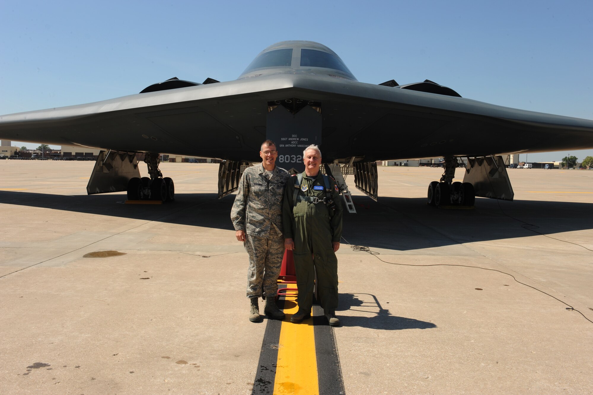 WHITEMAN AIR FORCE BASE, Mo. -- Brig. Gen. Thomas Bussiere, 509th Bomb Wing Commander, and Joe Scallorns, a member of Air Force Global Strike Command's Civic Leader Program, pose in front of the B-2 Spirit of Missouri before Scallorns incentive flight Sept. 12. The purpose of the incentive flight was to give him a better understanding and appreciation for the quality Airmen and civilians who protect the nation every day. (U.S. Air Force photo/Airman 1st Class Bryan Crane) (Released)