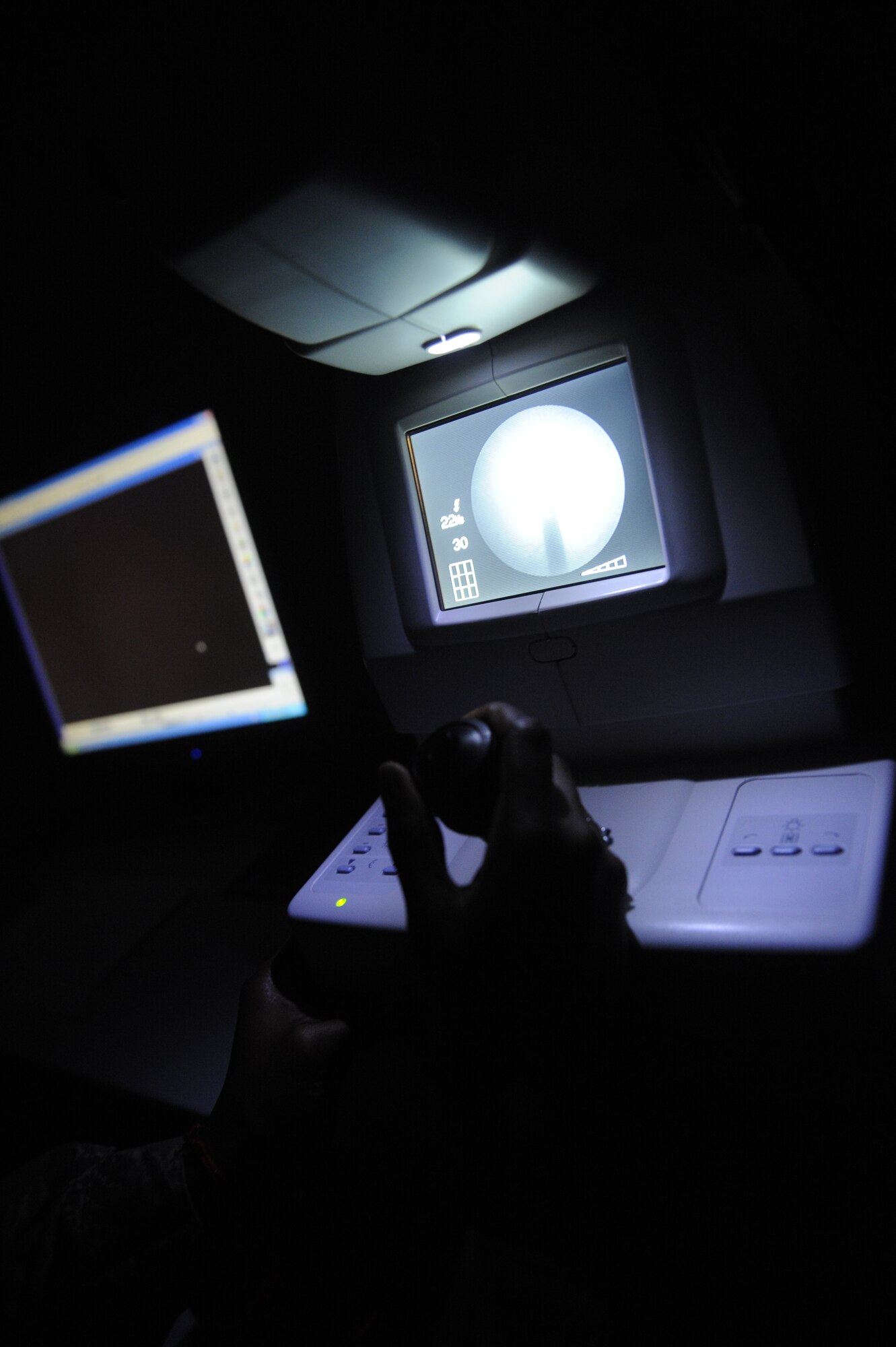 Staff Sgt. Shirley Taylor 86th Medical Group aerospace optometry technician, takes a photo of a patient's eye at the Optometry Clinic Ramstein Air Base, Germany, Sept. 12, 2012. Members of the Ramstein Optometry Clinic key in on their patient’s needs, ensuring they receive the right care. (U.S. Air Force photo/ Senior Airman Aaron-Forrest Wainwright)