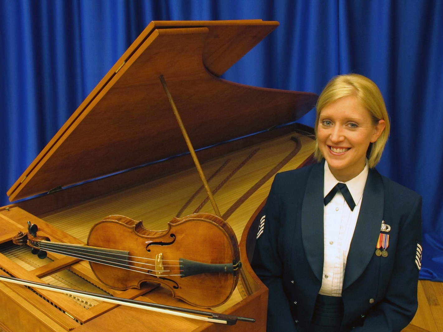 Soprano, Technical Sgt. Mandi Harper will perform a recital of music by J.S. Bach with Baroque violinist, Senior Master Sgt. Bill Tortolano and harpsichordist, Master Sgt. Steve Erickson on Sep. 23 at 3 p.m. in Alexandria, Va. (Air Force photo by Chief Master Sgt. Jan Duga)