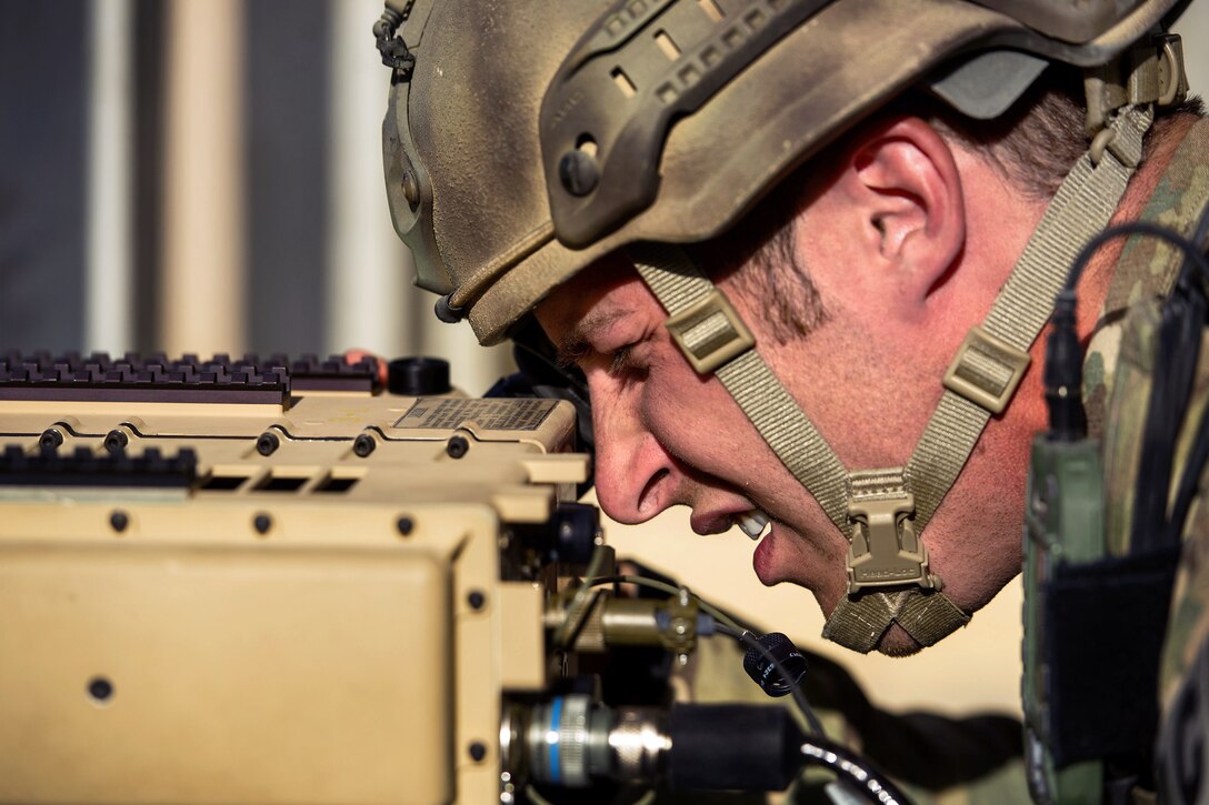 U.S. Air Force 1st Lt. Drew Parks uses a laser target designator to mark the target for a laser-guided bomb while supporting Operation Spartan Shield in Southwest Asia, Sept. 11, 2012. 
