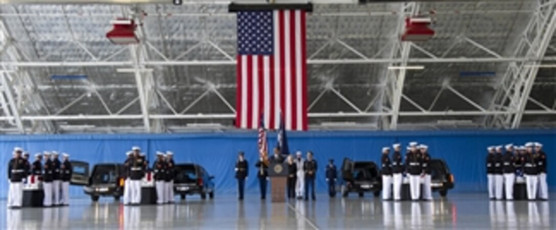 President Barack Obama speaks at the dignified transfer ceremony for the U.S. Ambassador to Libya J. Christopher Stevens, Foreign Service officer Sean Smith, and security officers Tyrone S. Woods and Glen A. Doherty at Joint Base Andrews, Md., on Sept. 14, 2012.  